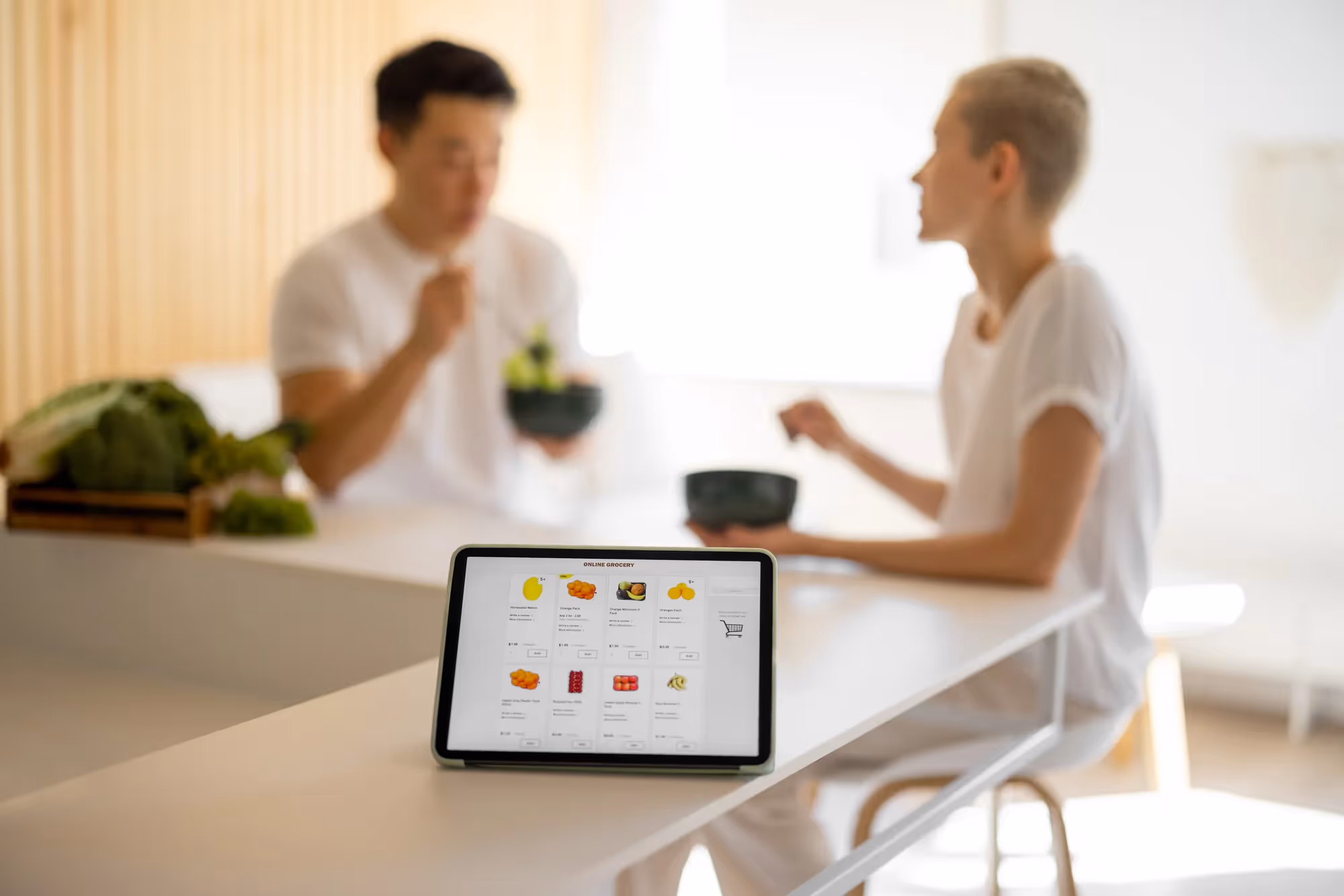 A tablet with a picture of food on it.