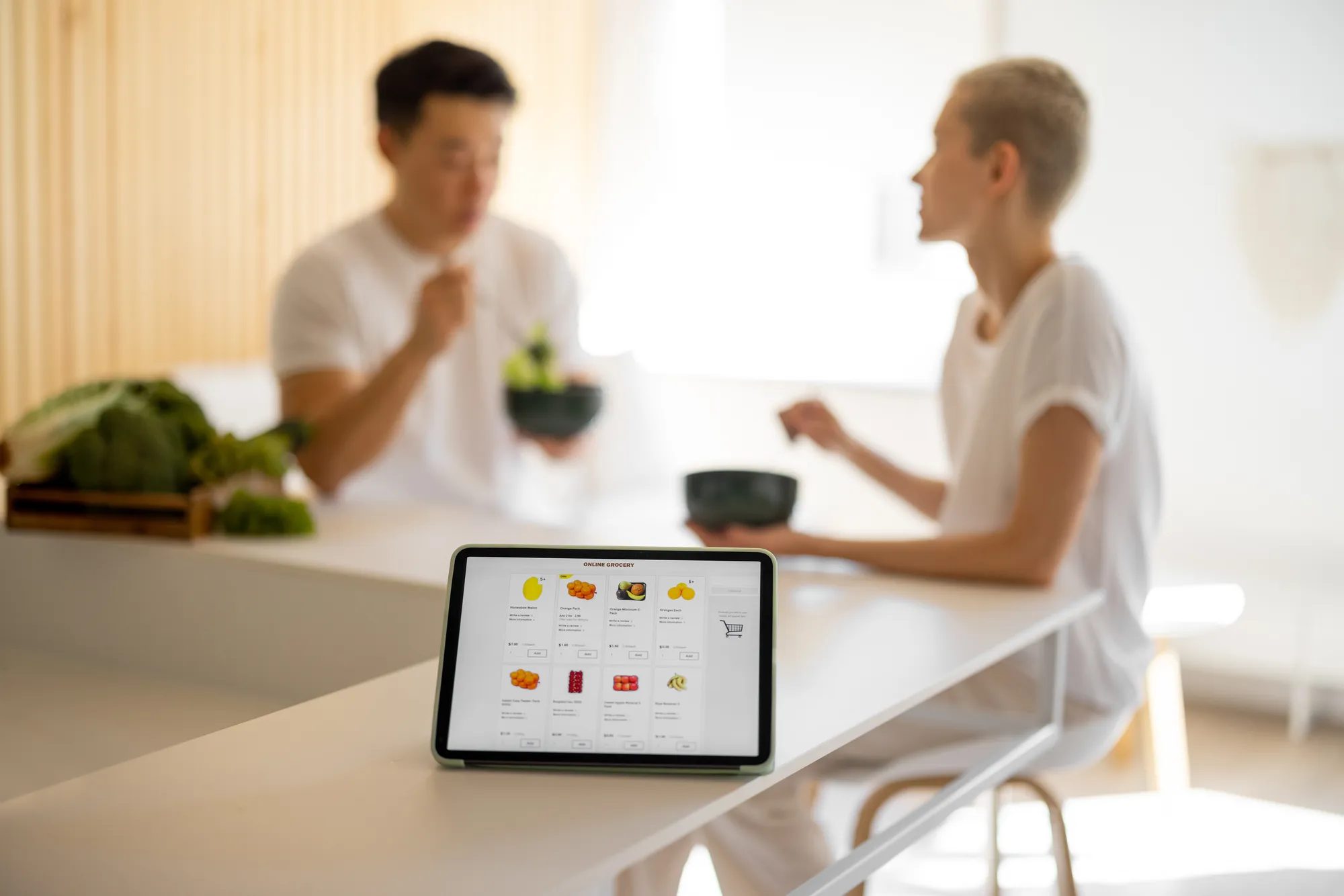 A tablet with a picture of food on it.