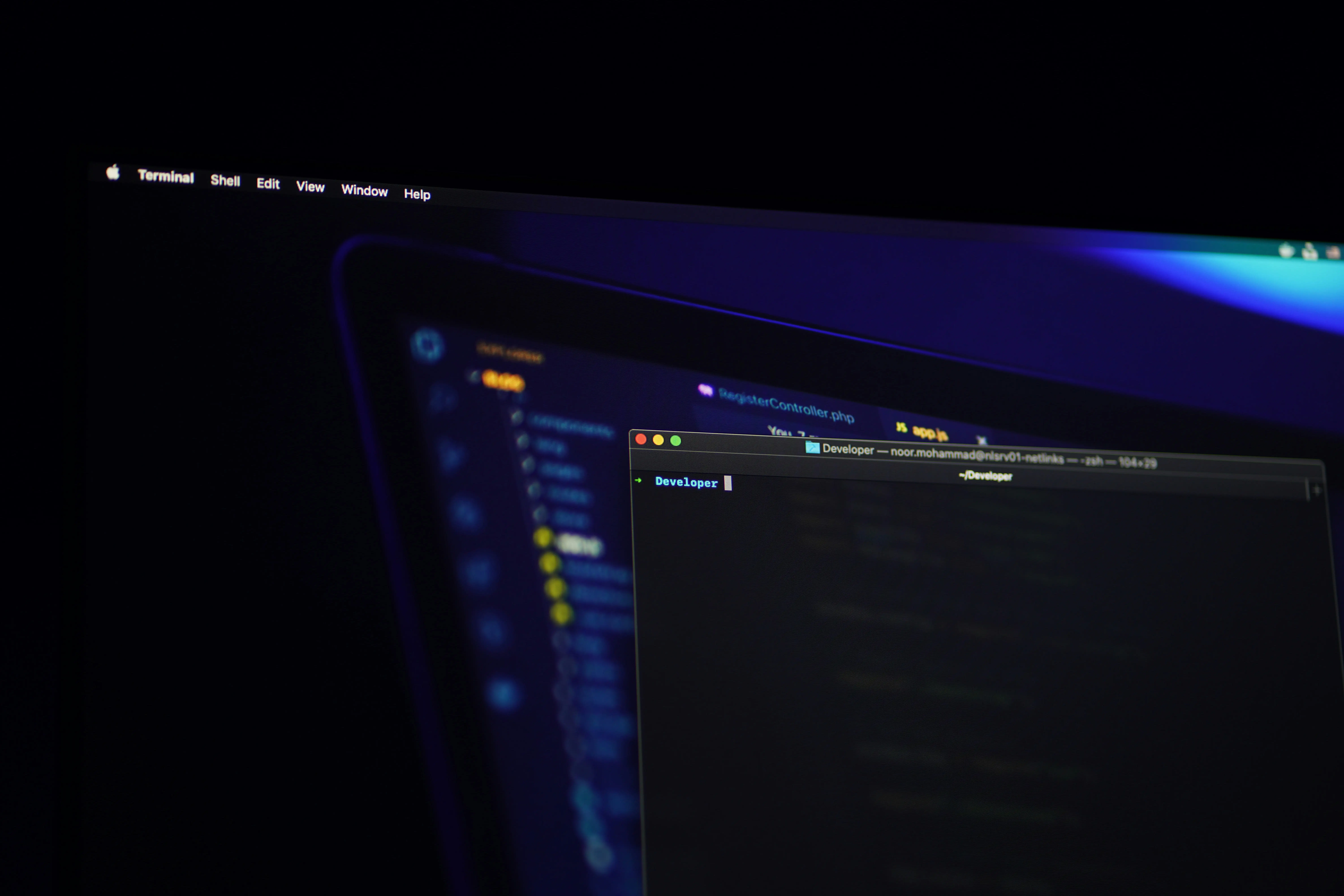 A laptop screen with a blue background and a black screen.