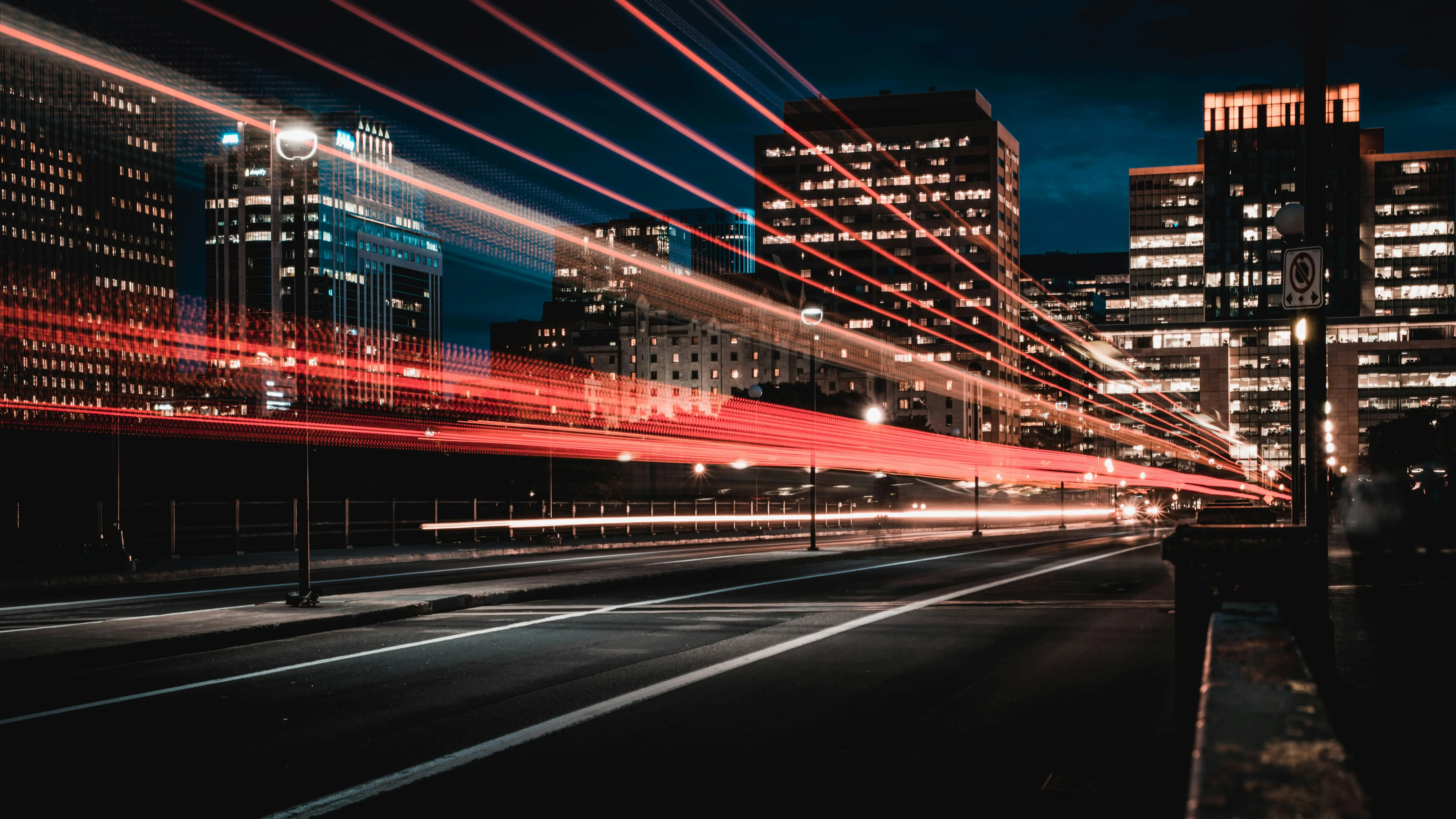 A blurry image of a city street at night.