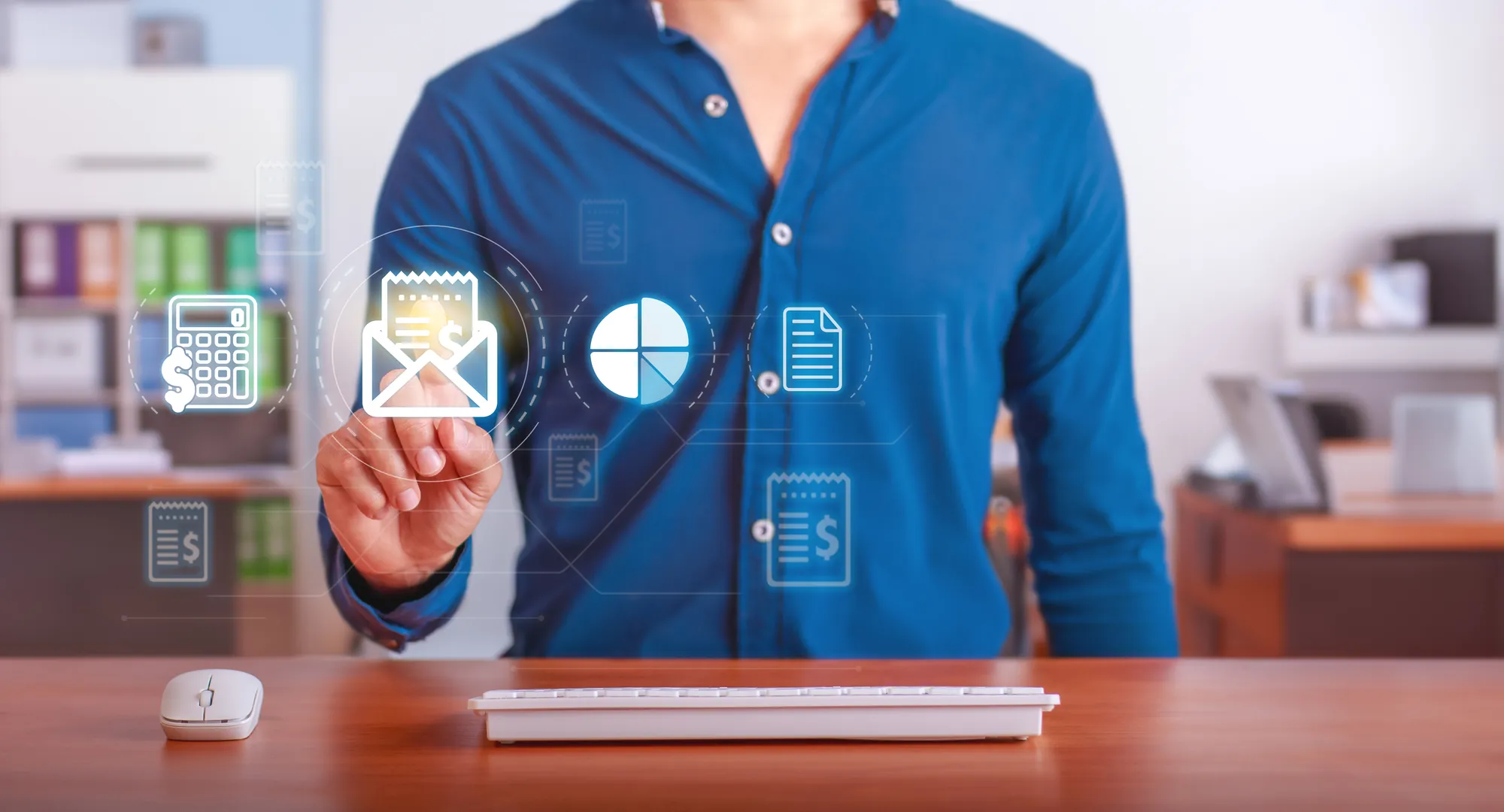 A man wearing a blue shirt with icons on it.