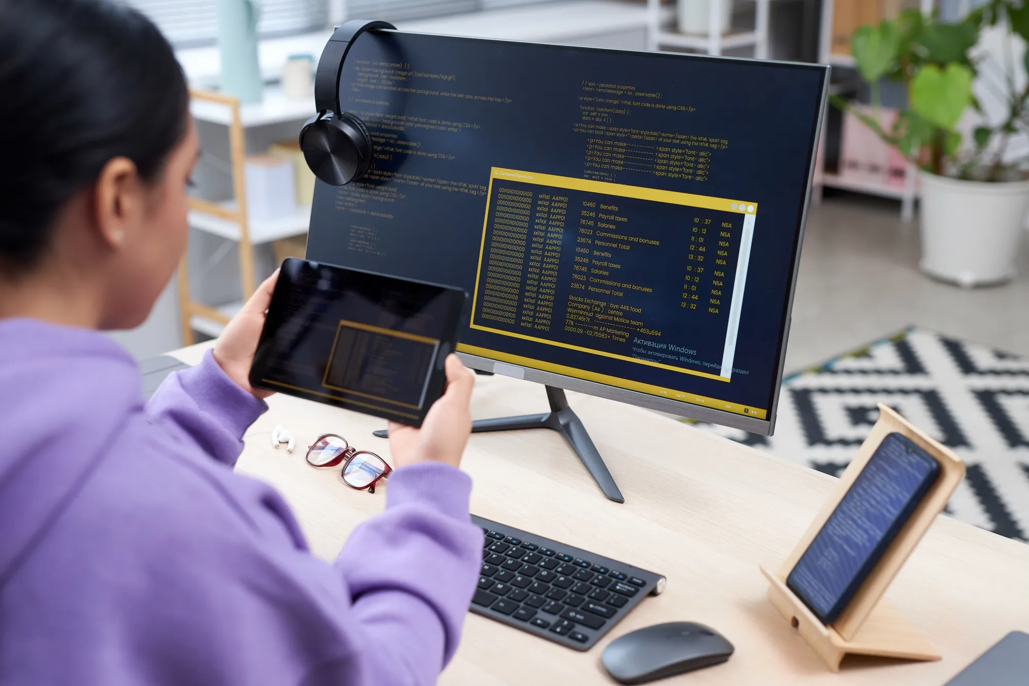 A person holding a tablet computer.