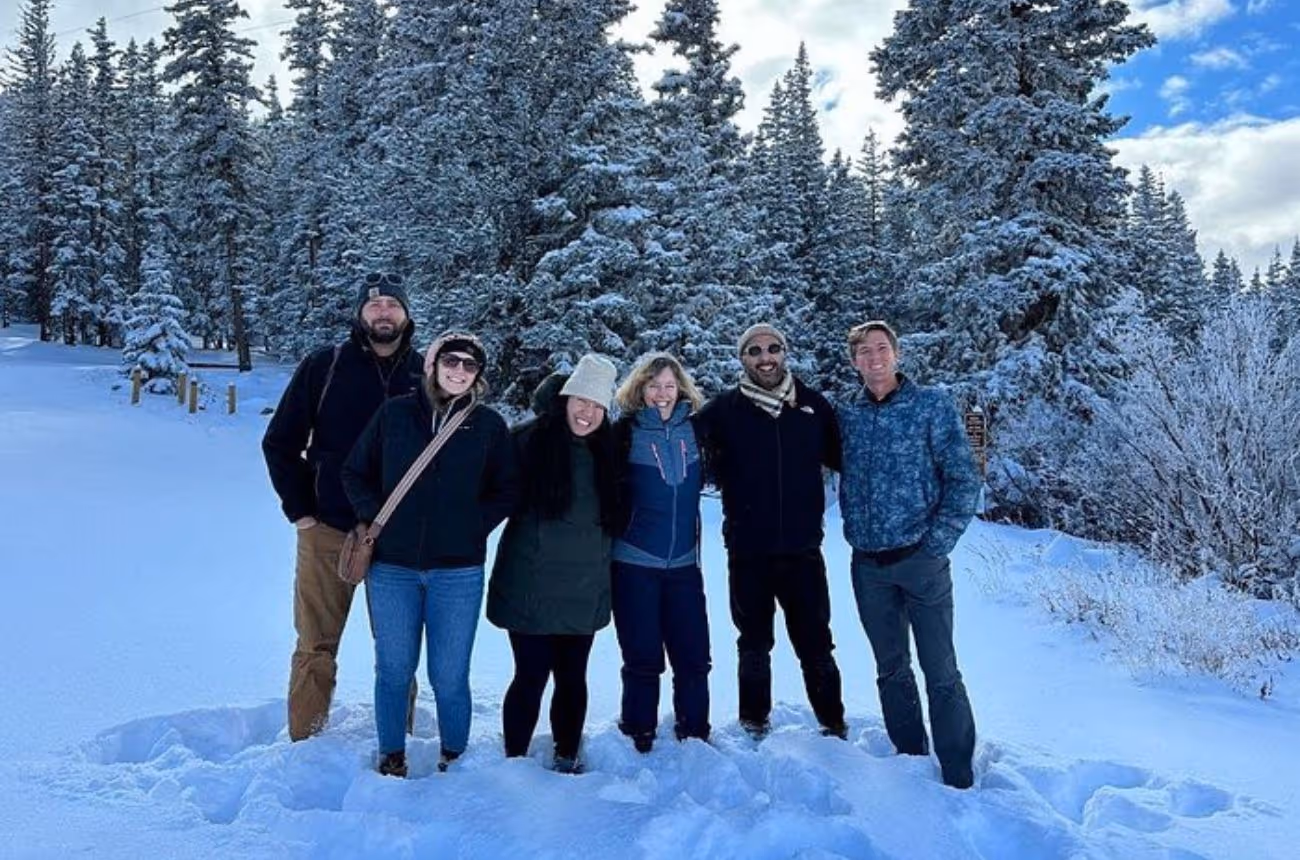 A local expert guide leads a small group on a half-day tour in the Colorado Rockies, featuring scenic drives, short guided walks, and breathtaking views for a personalized and intimate experience.