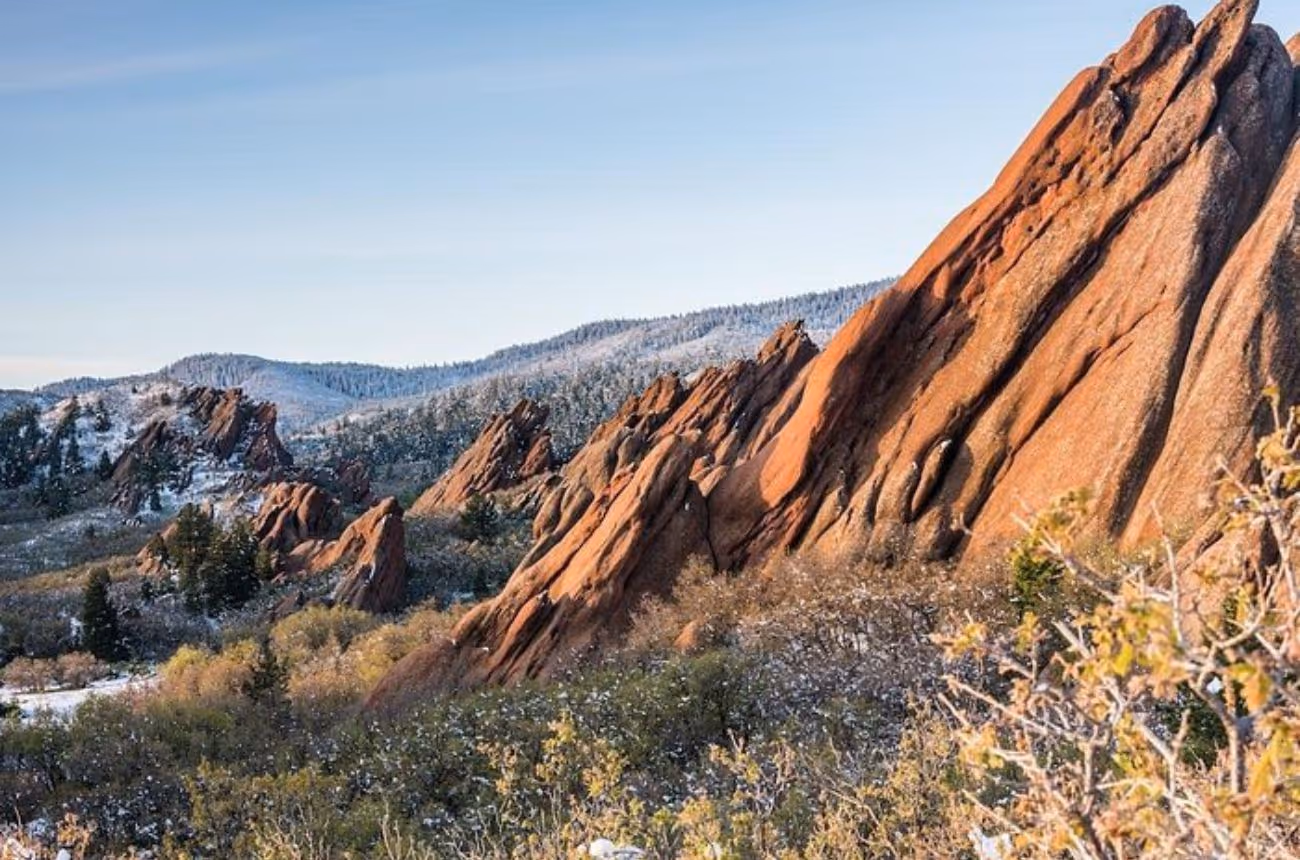 Experience a personalized half-day tour from Denver, visiting Red Rocks Amphitheater, driving the Lariat Loop, enjoying Lookout Mountain views, and relaxing in Golden with a drink.