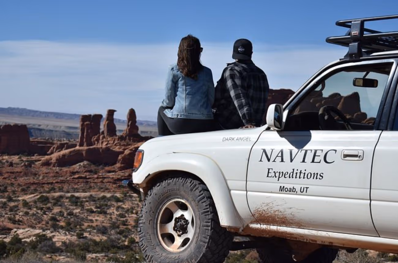 Embark on a guided 4x4 adventure through Arches National Park's secluded backcountry, exploring hidden arches, fossilized dinosaur tracks, and dramatic sandstone formations away from the typical tourist paths.