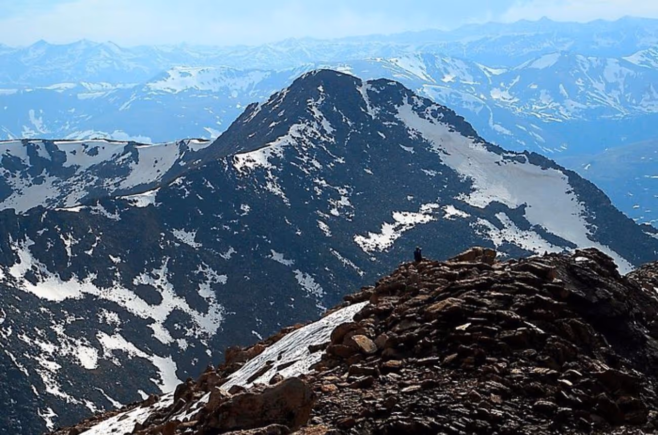 Experience Colorado's breathtaking landscapes and landmarks on a full-day trip from Denver, featuring Red Rocks Amphitheatre, Loveland Pass, and Breckenridge with opportunities for photos, shopping, and dining.