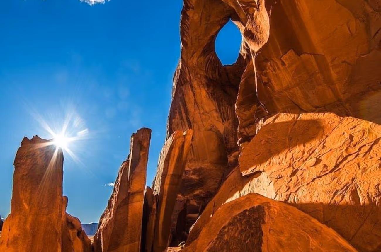 Embark on a 2.5 to 3-hour guided tour through Monument Valley's iconic landscapes, led by a Navajo guide who shares insights into the area's culture, history, and natural wonders.