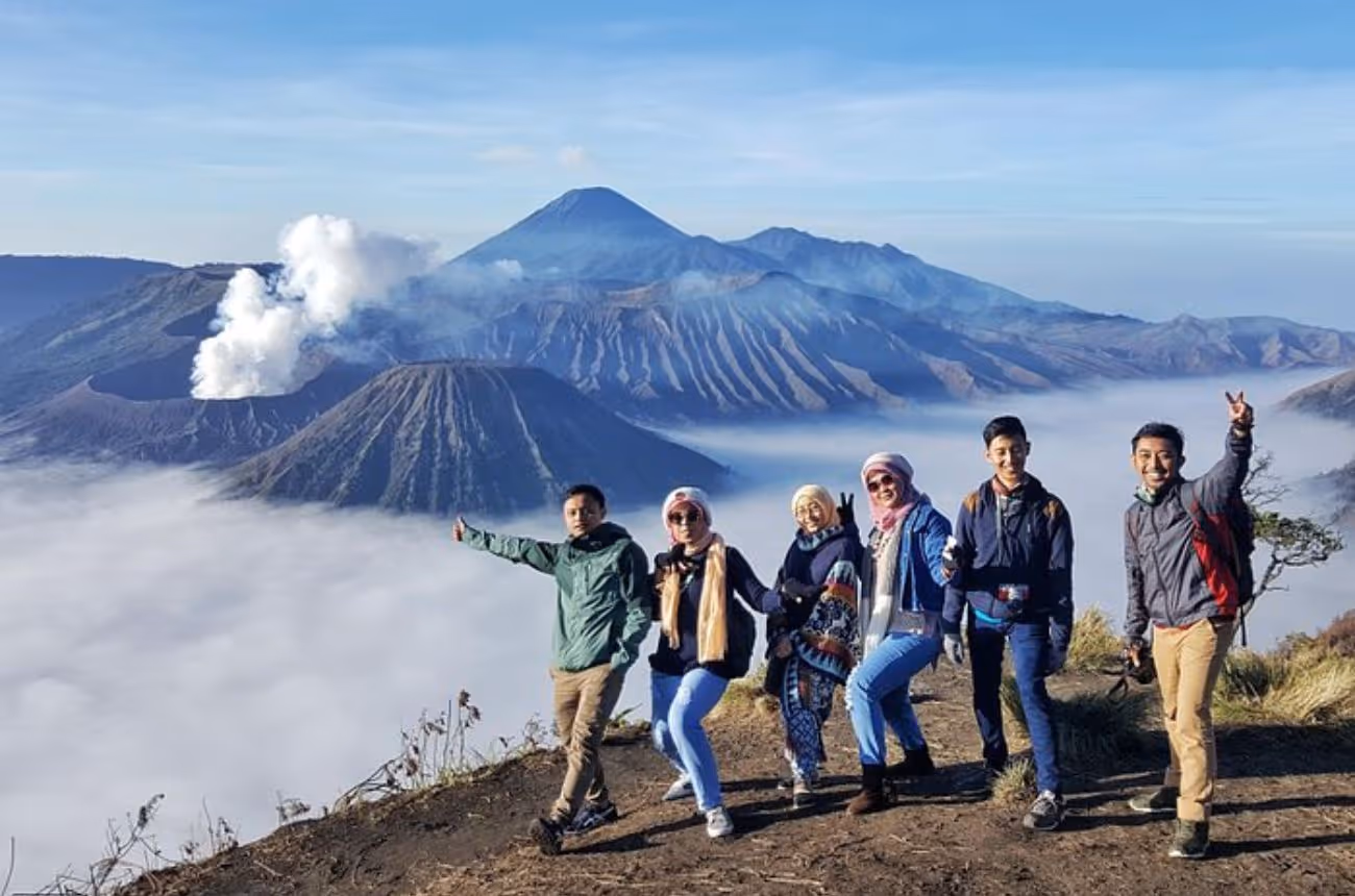 Embark on an early-morning 4WD adventure from Malang to witness the unforgettable sunrise over Mount Bromo’s steaming crater, set amidst the golden “Sea of Sand.”