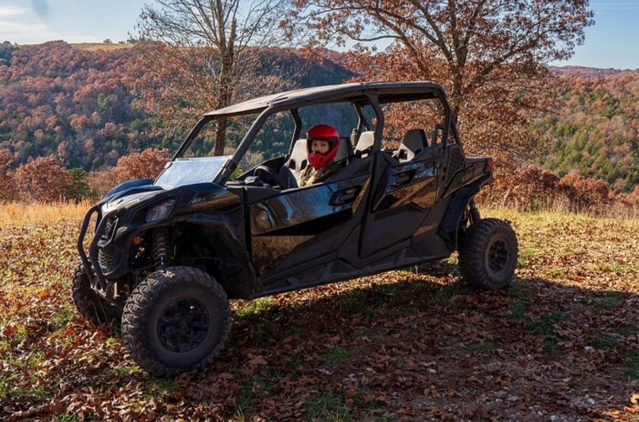 Embark on a thrilling off-road adventure through the Ozark Mountains, navigating diverse terrains in a 4-seater vehicle.