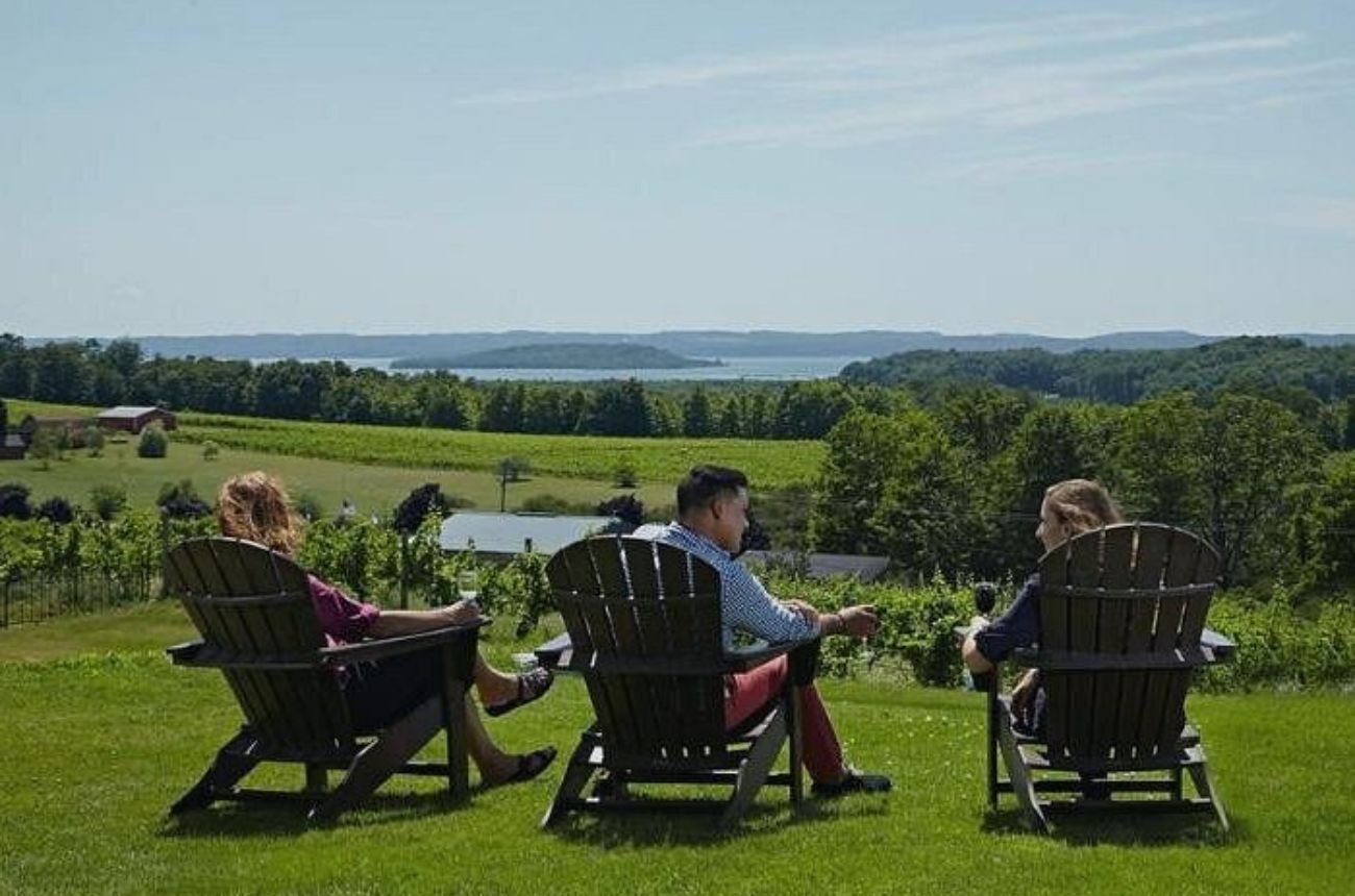 Enjoy a stress-free wine-tasting tour on Old Mission Peninsula, visiting four top wineries with transportation provided, ideal for friends and wine lovers.