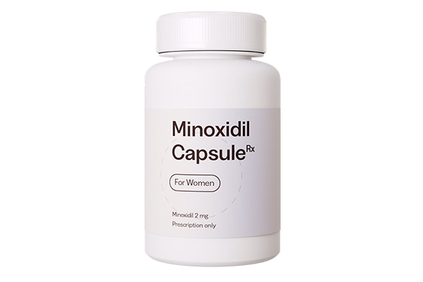 White bottle labeled Minoxidil Capsule Rx for women, 2 mg, prescription only.