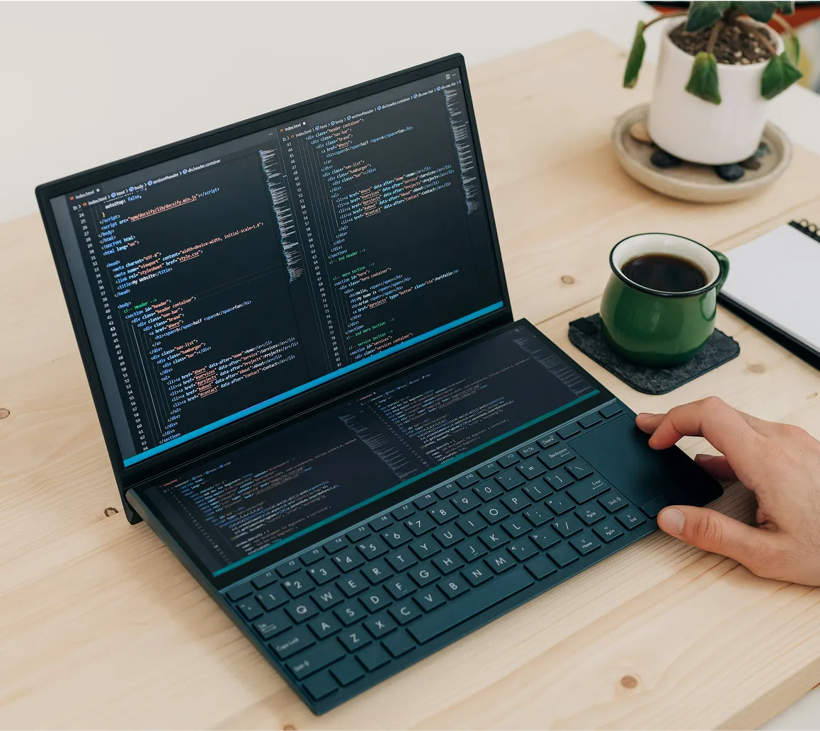 Developer laptop showing code for payment API integration