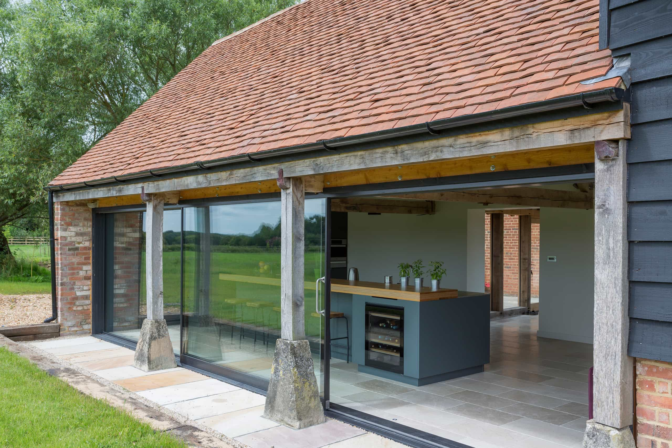 glass-sliding-doors-of-converted-barn-home