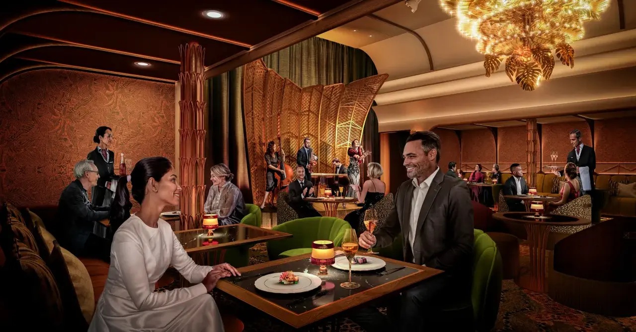 1. A couple enjoys a meal at a table in the Hollywoodland Supper Club on Legend of the Seas.