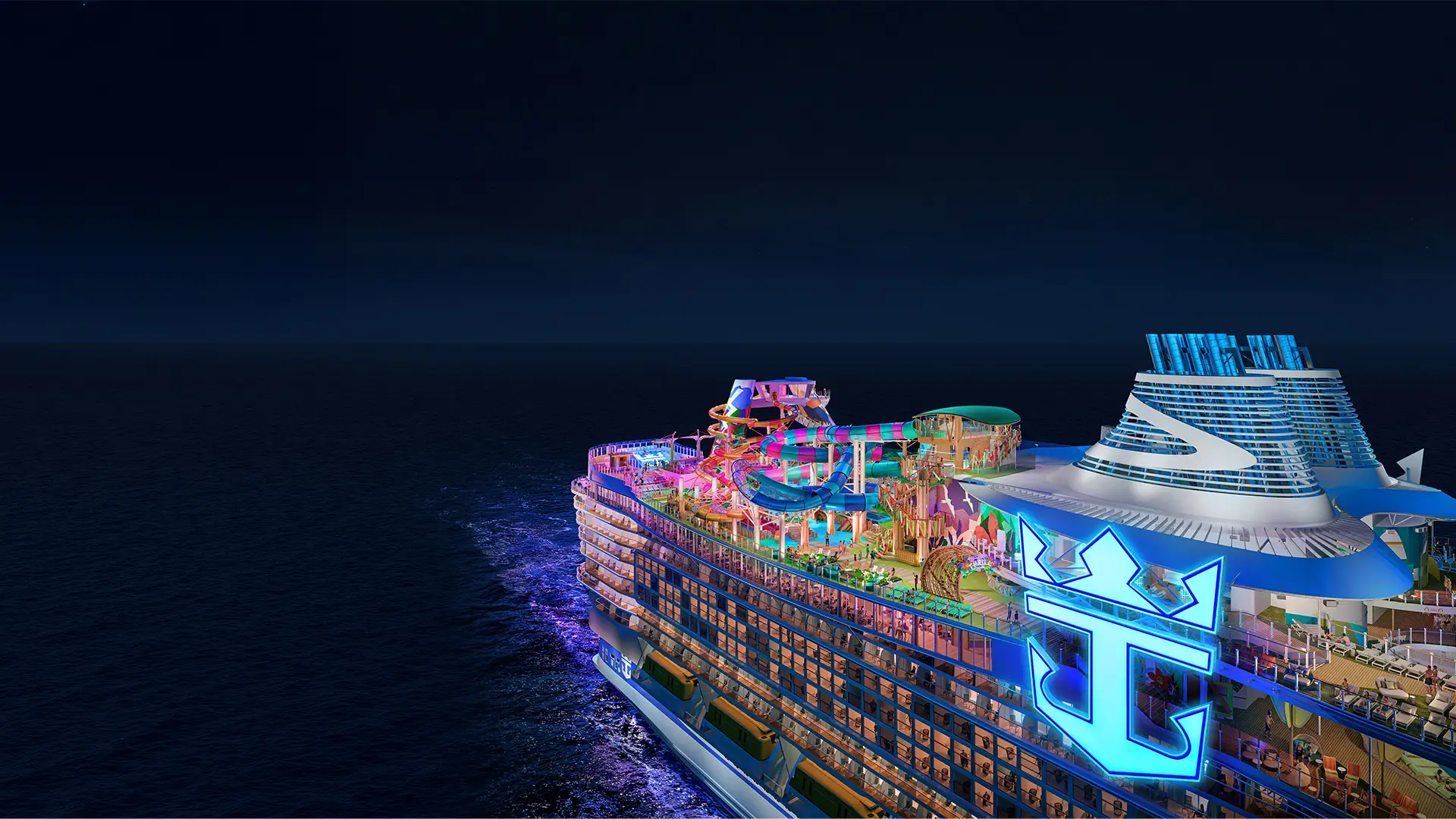 A Royal Caribbean cruise ship, Legend of the Seas, illuminated with colorful lights against a night sky.