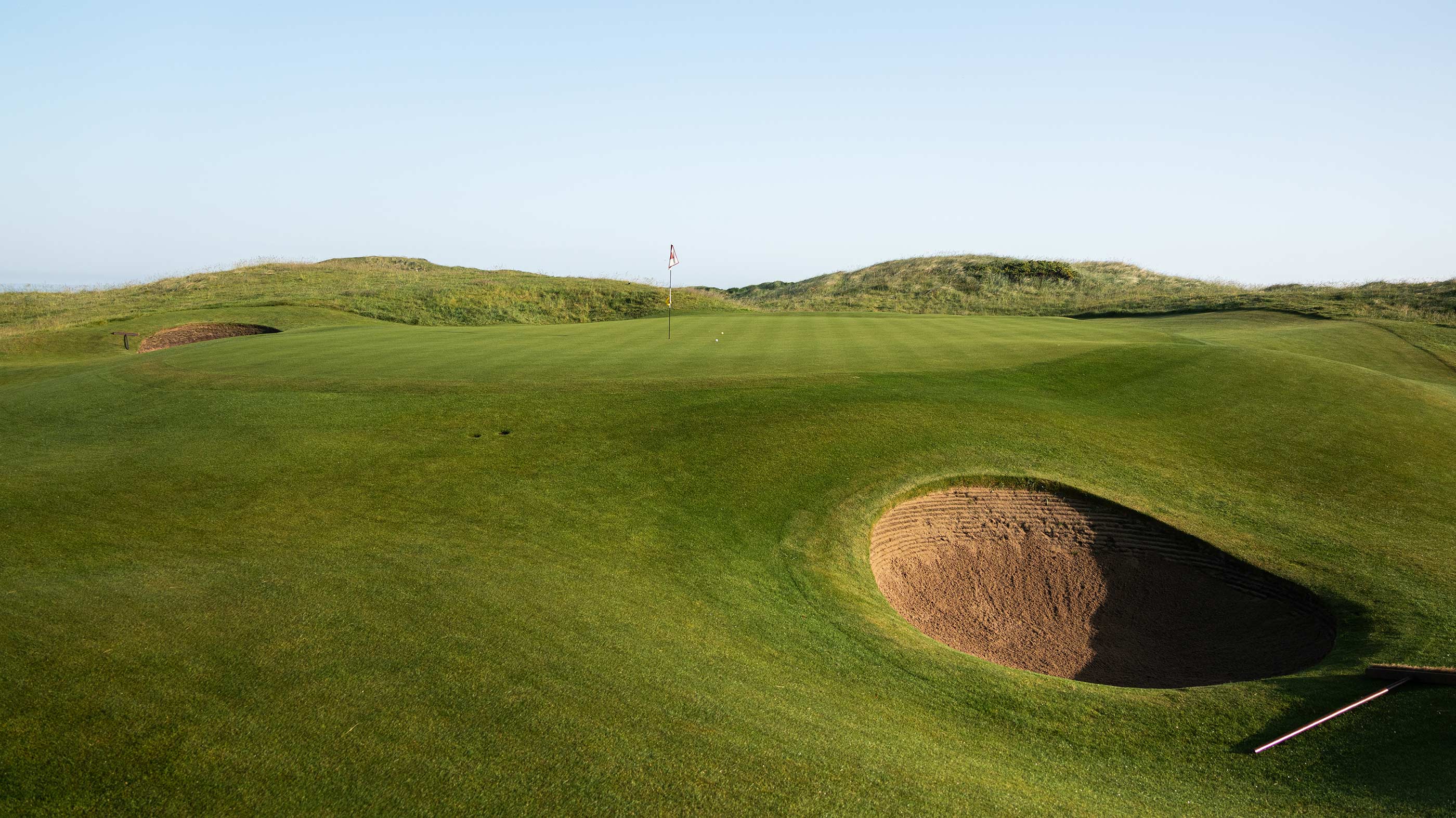 Bunker guarding the second green at Ballybunion Old (Fried Egg Golf)