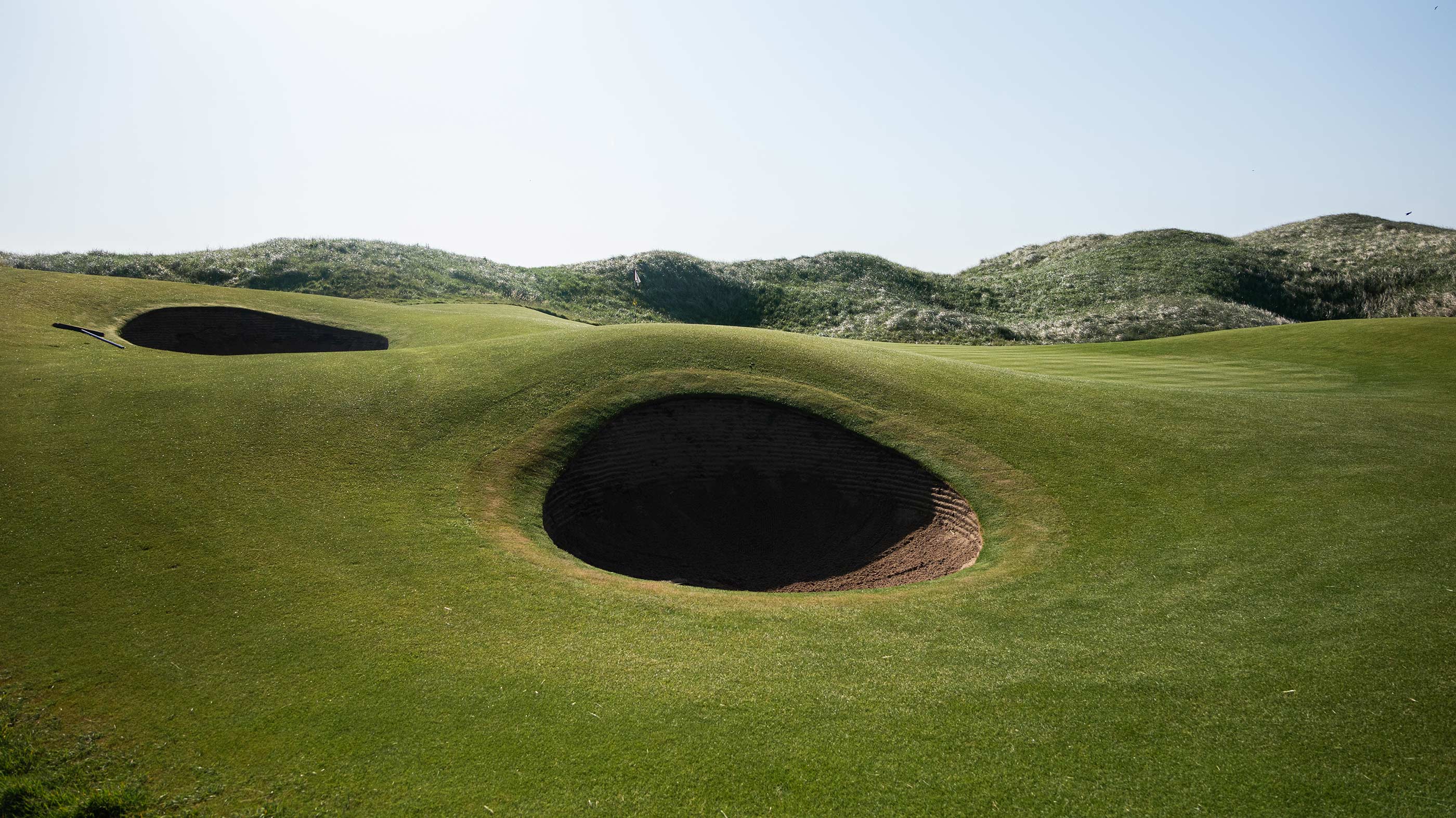 Bunker guarding the eighth green at Ballybunion Old (Fried Egg Golf)