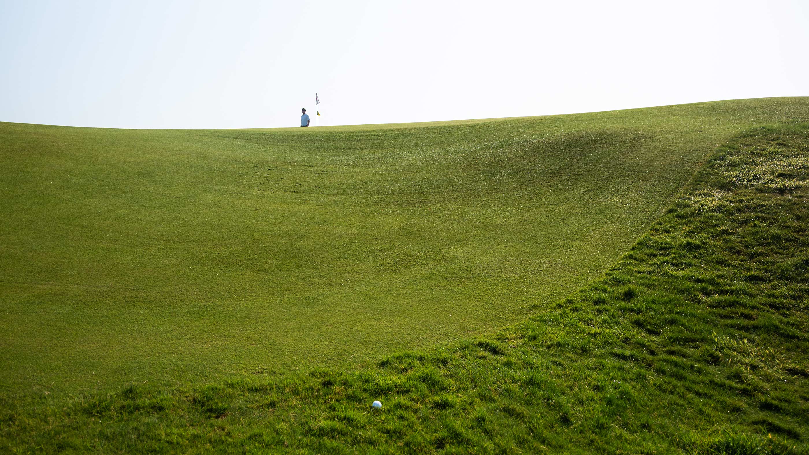 Slope off the ninth green at Ballybunion Old (Fried Egg Golf)