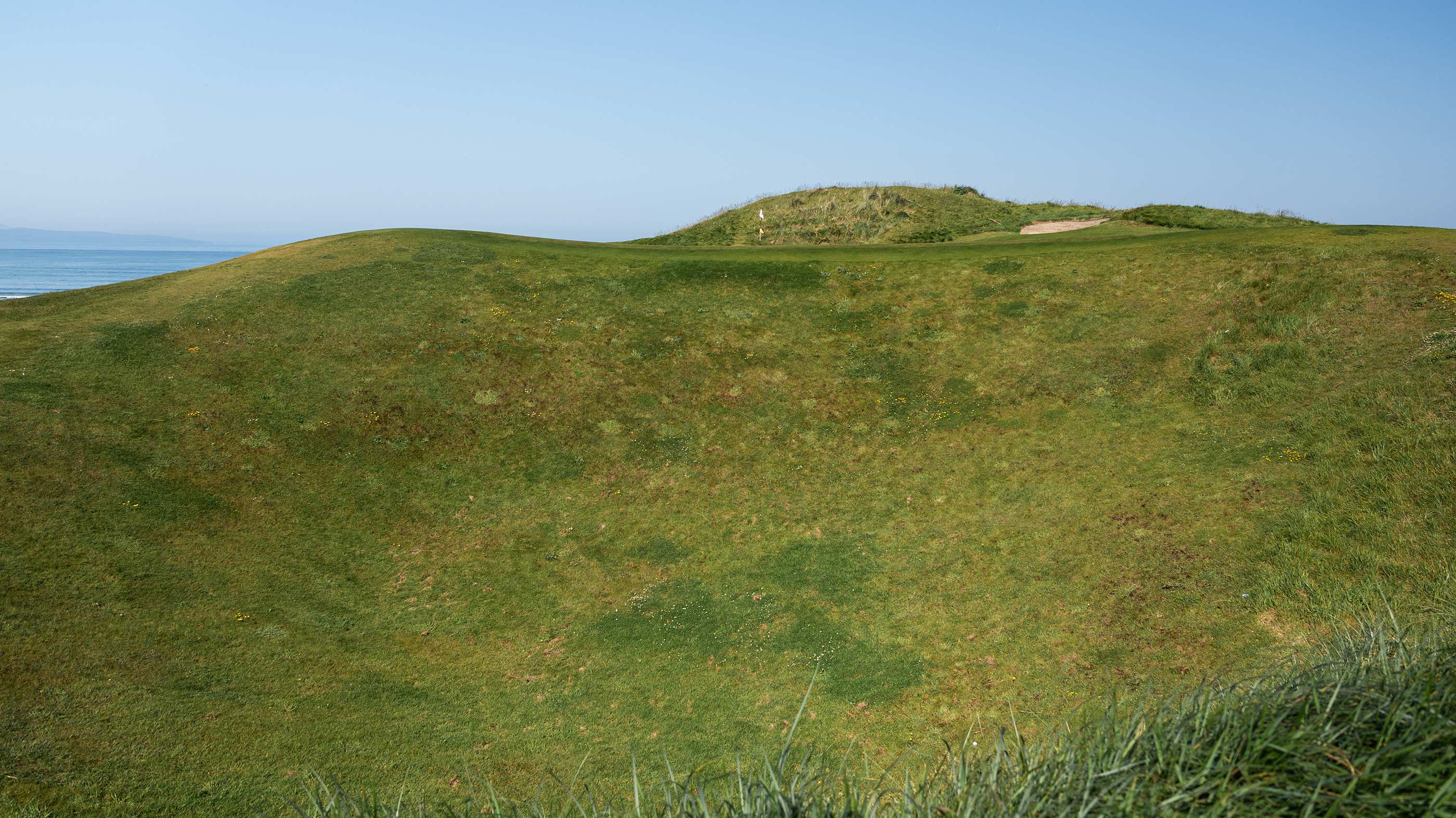 Bottom of the hill next to the 12th green at Ballybunion Old (Fried Egg Golf)