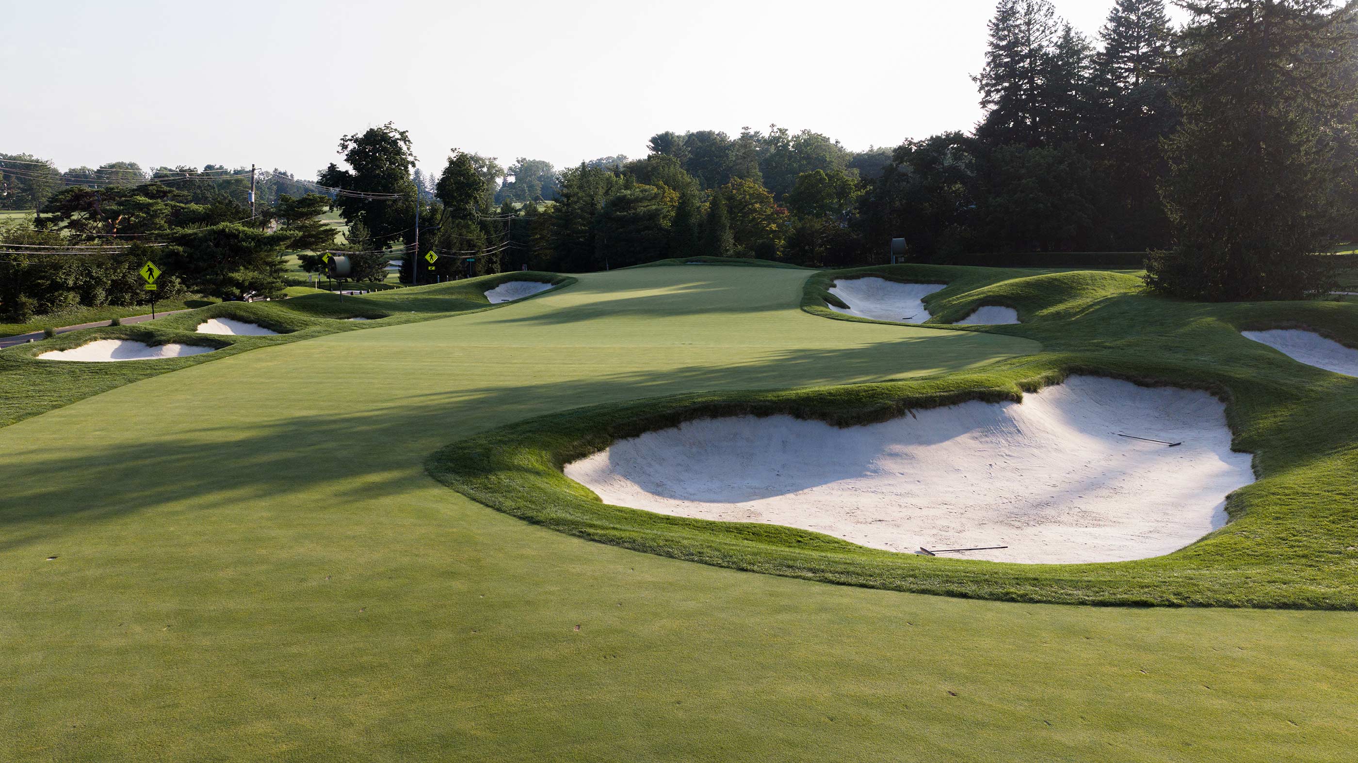 Bunker guarding the first approach at Merion East (Fried Egg Golf)