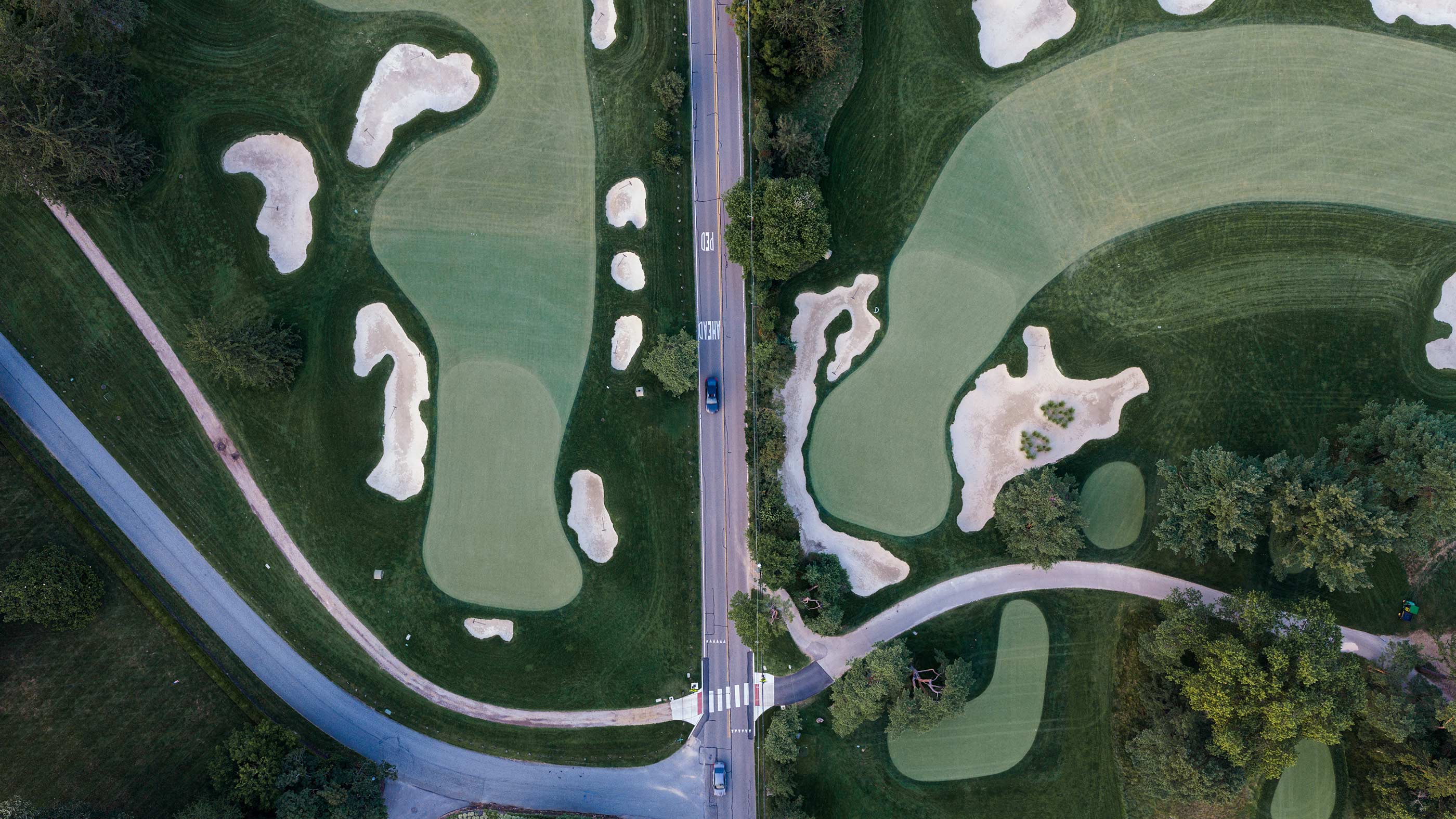 High above Nos. 1 (left) and 10 (right) at Merion East (Fried Egg Golf)