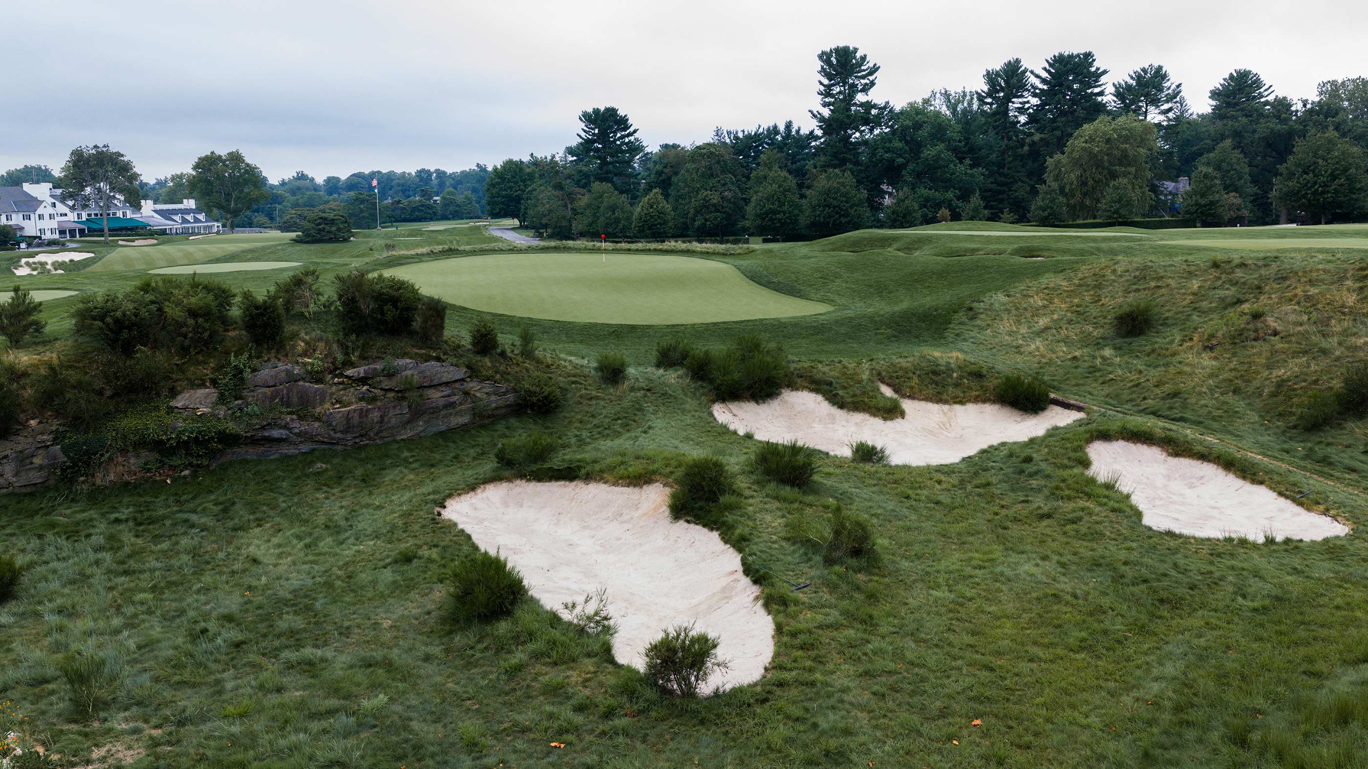 Bunkers guarding the 16th green at Merion East (Fried Egg Golf)