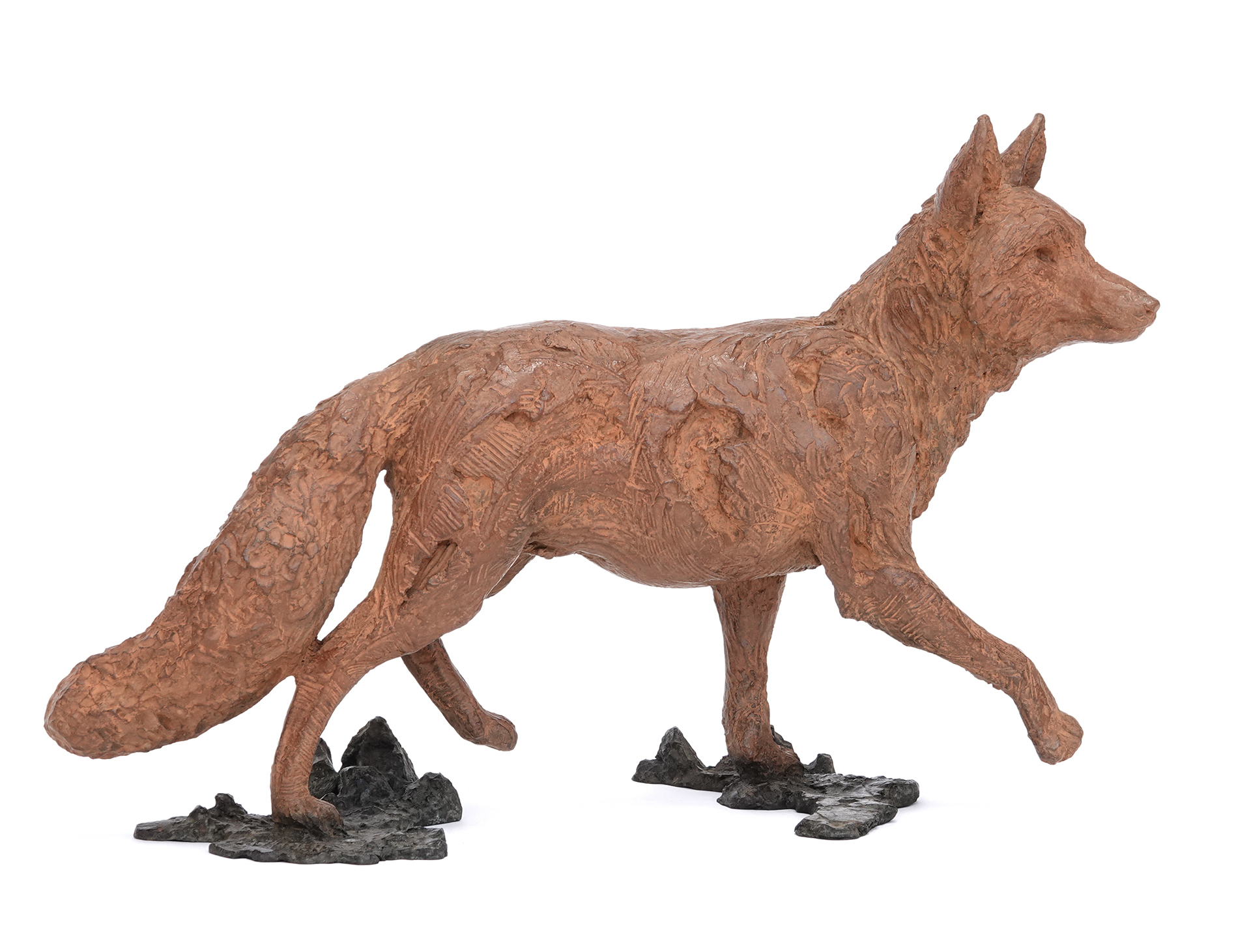 Bronze animal sculpture of a stealthy walking fox on textured base, by wildlife sculptor Pierre-Jean Chabert.