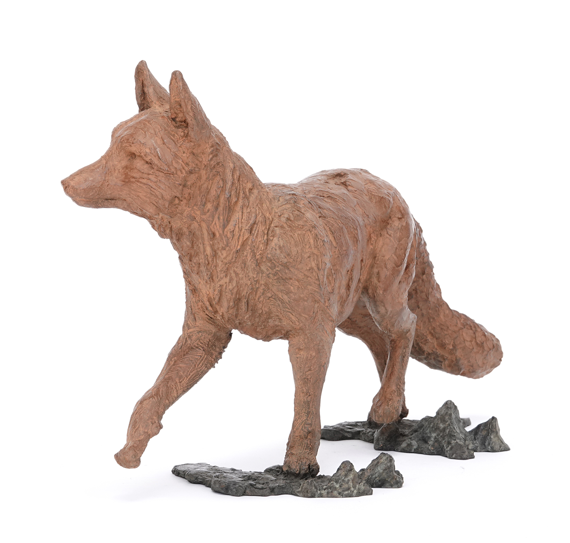 Bronze animal sculpture of a stealthy walking fox on textured base, by wildlife sculptor Pierre-Jean Chabert.