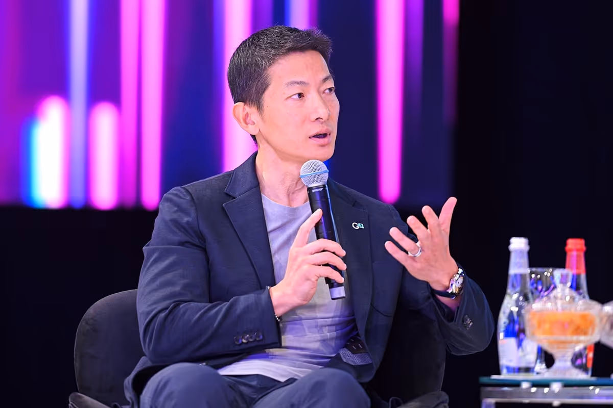 G42 CEO Peng Xiao discussing AI expansion and US partnerships at technology conference panel