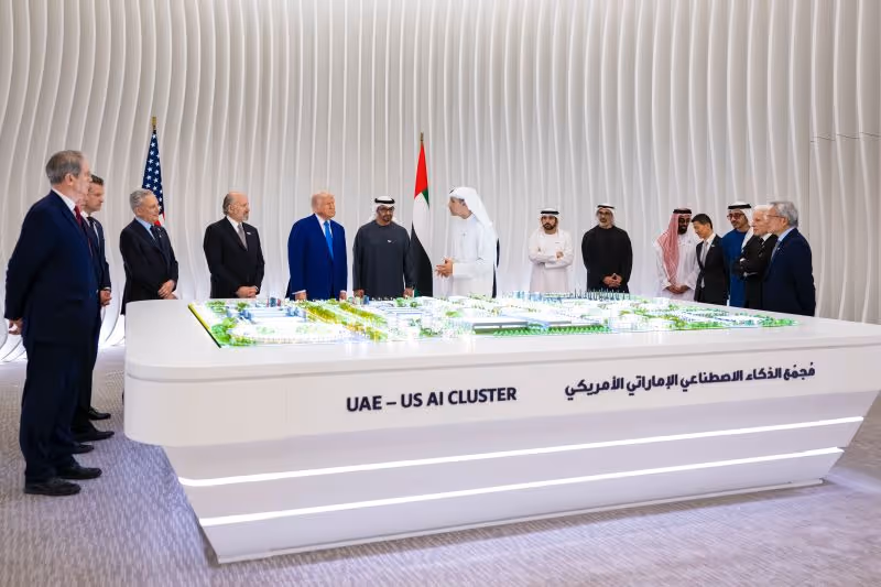 UAE and US officials viewing architectural model of UAE-US AI Cluster infrastructure development project