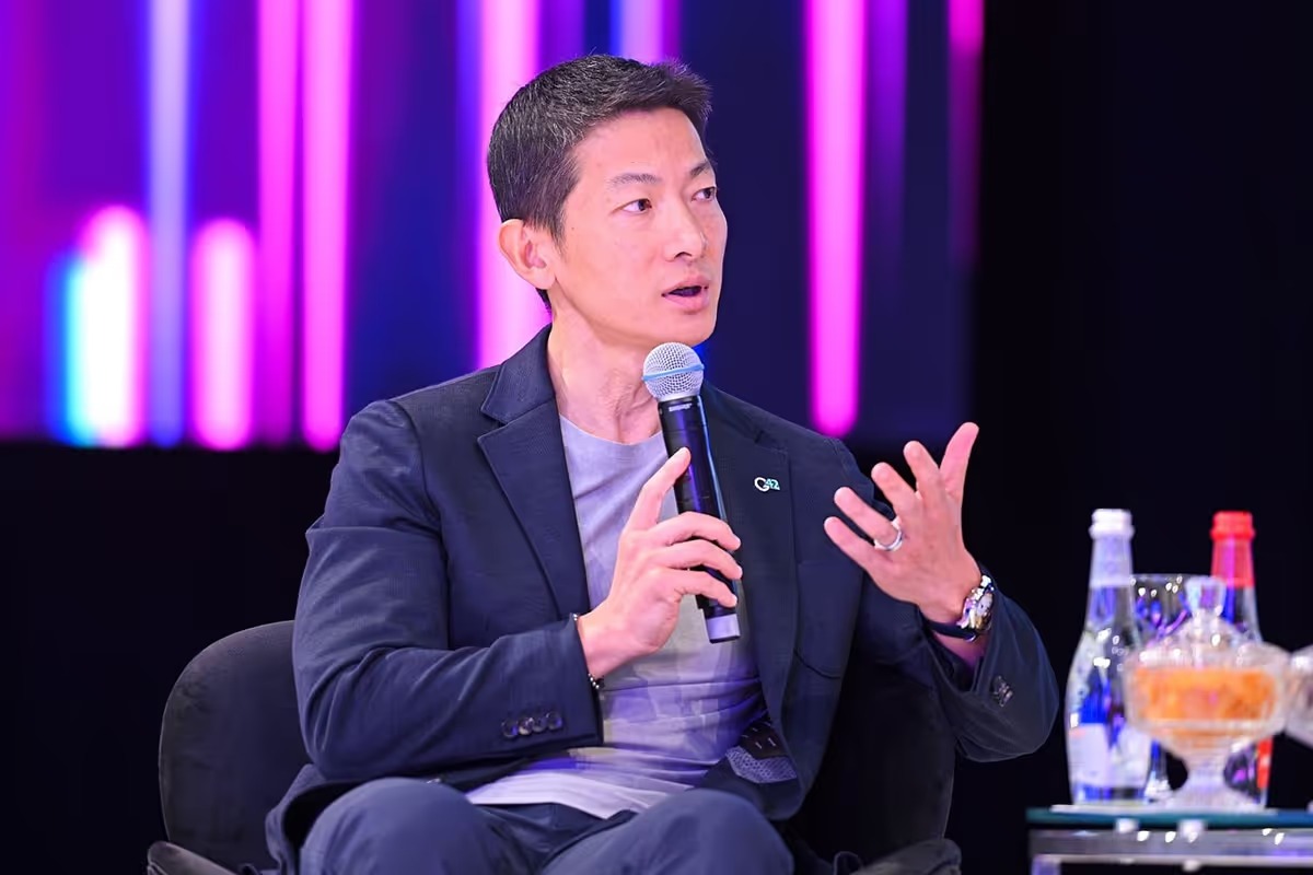 G42 CEO Peng Xiao discussing AI expansion and US partnerships at technology conference panel