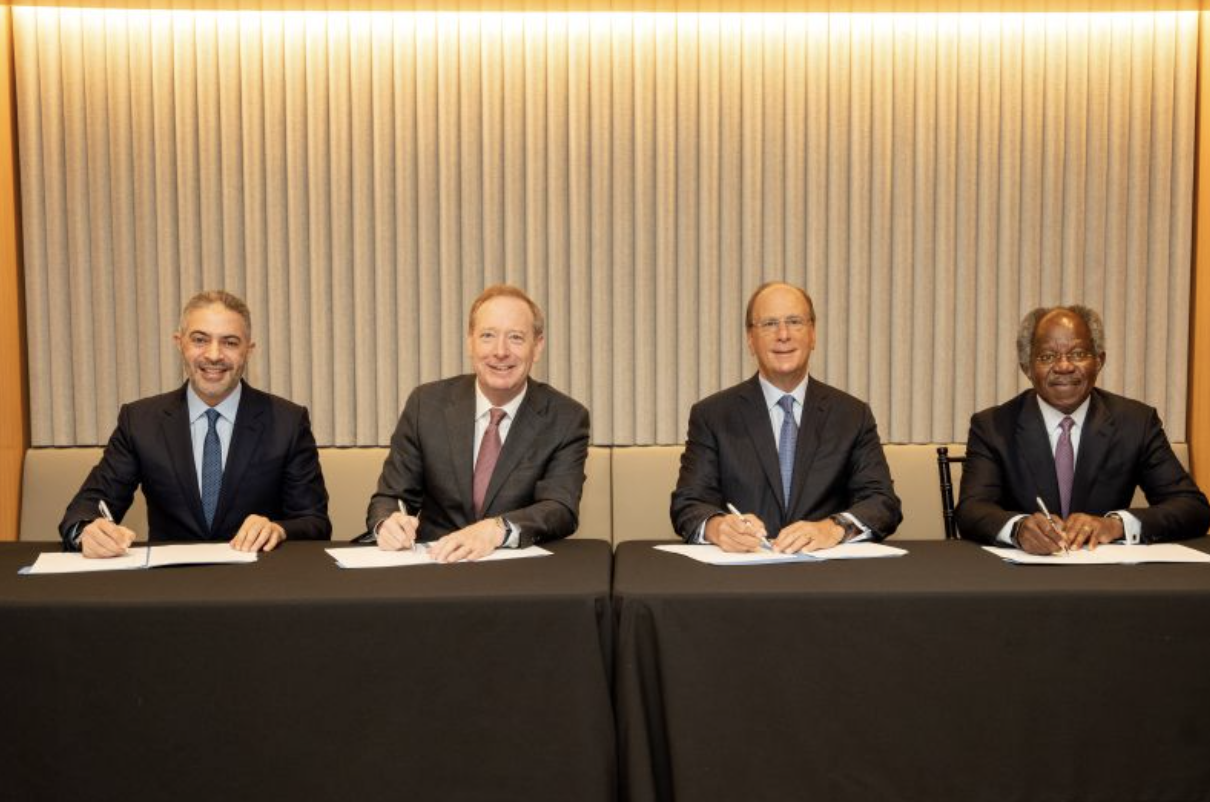 (pictured left to right) Ahmed Yahia Al Idrissi, CEO of MGX; Brad Smith, Vice Chair and President of Microsoft; Larry Fink, Chairman and CEO of BlackRock; Bayo Ogunlesi, Chairman and CEO of Global Infrastructure Partner