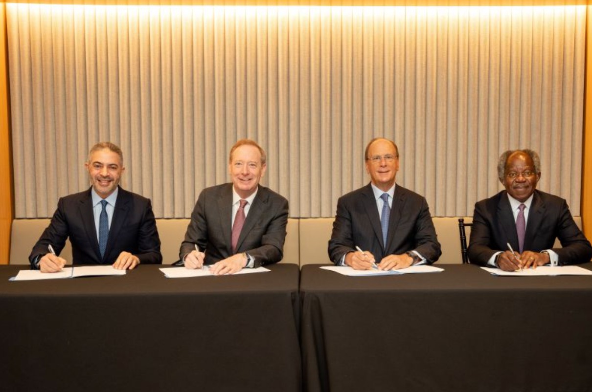 (pictured left to right) Ahmed Yahia Al Idrissi, CEO of MGX; Brad Smith, Vice Chair and President of Microsoft; Larry Fink, Chairman and CEO of BlackRock; Bayo Ogunlesi, Chairman and CEO of Global Infrastructure Partner