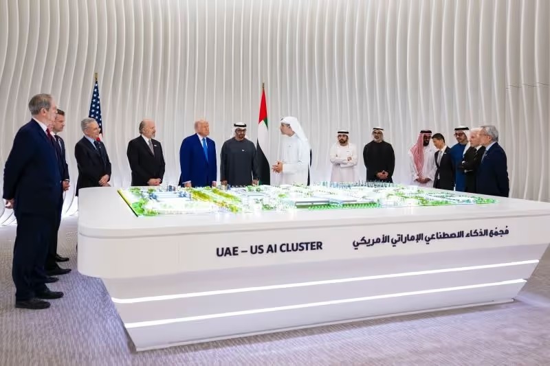 UAE and US officials viewing architectural model of UAE-US AI Cluster infrastructure development project