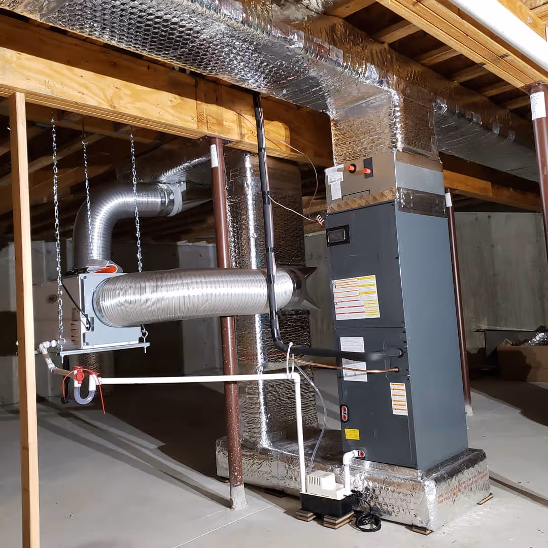 Residential HVAC system with ductwork installed in basement or utility room