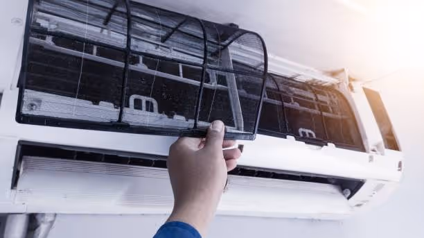 Hand adjusting wall-mounted air conditioning unit with open front panel