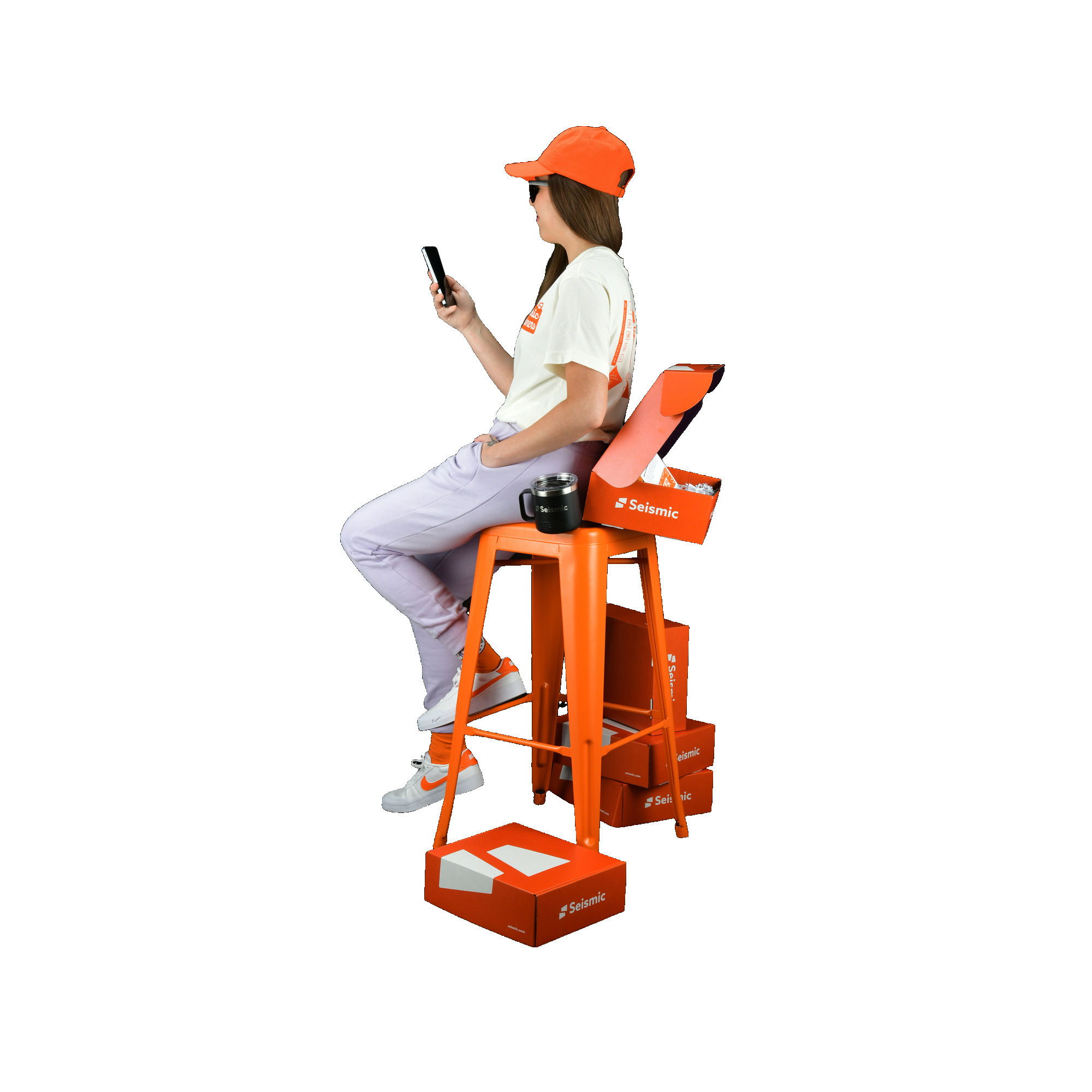 girl using mobile and setting on the chair image 18