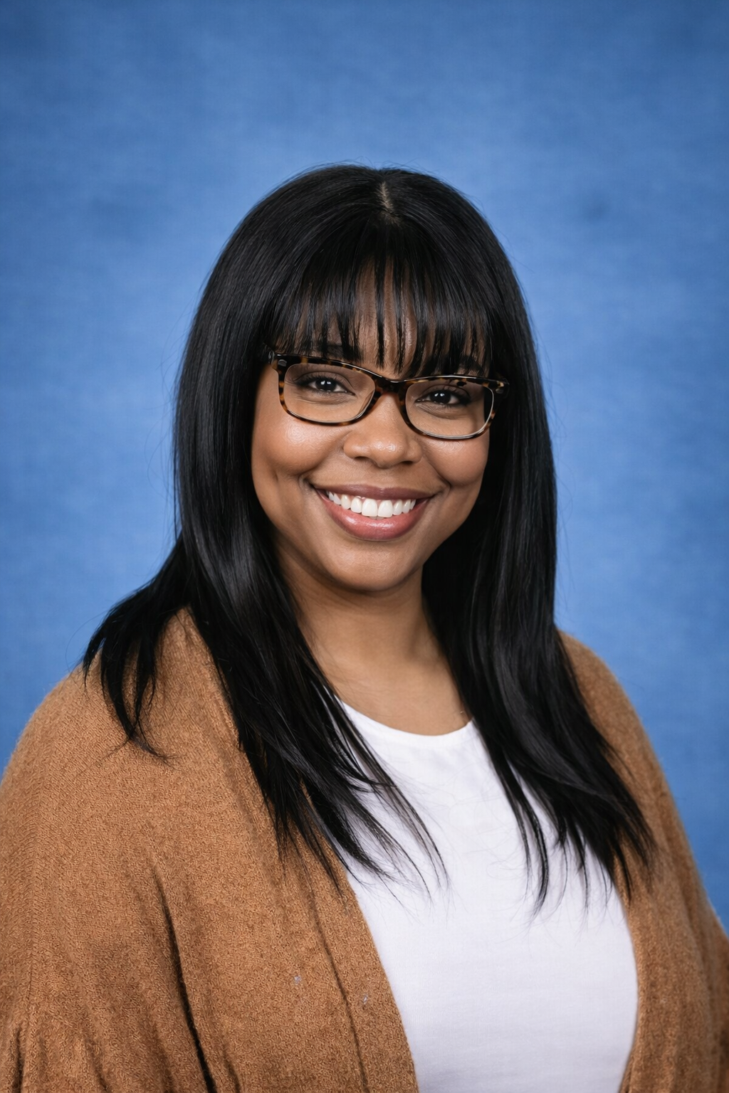 Staff member A. Bridgeman smiling in professional headshot