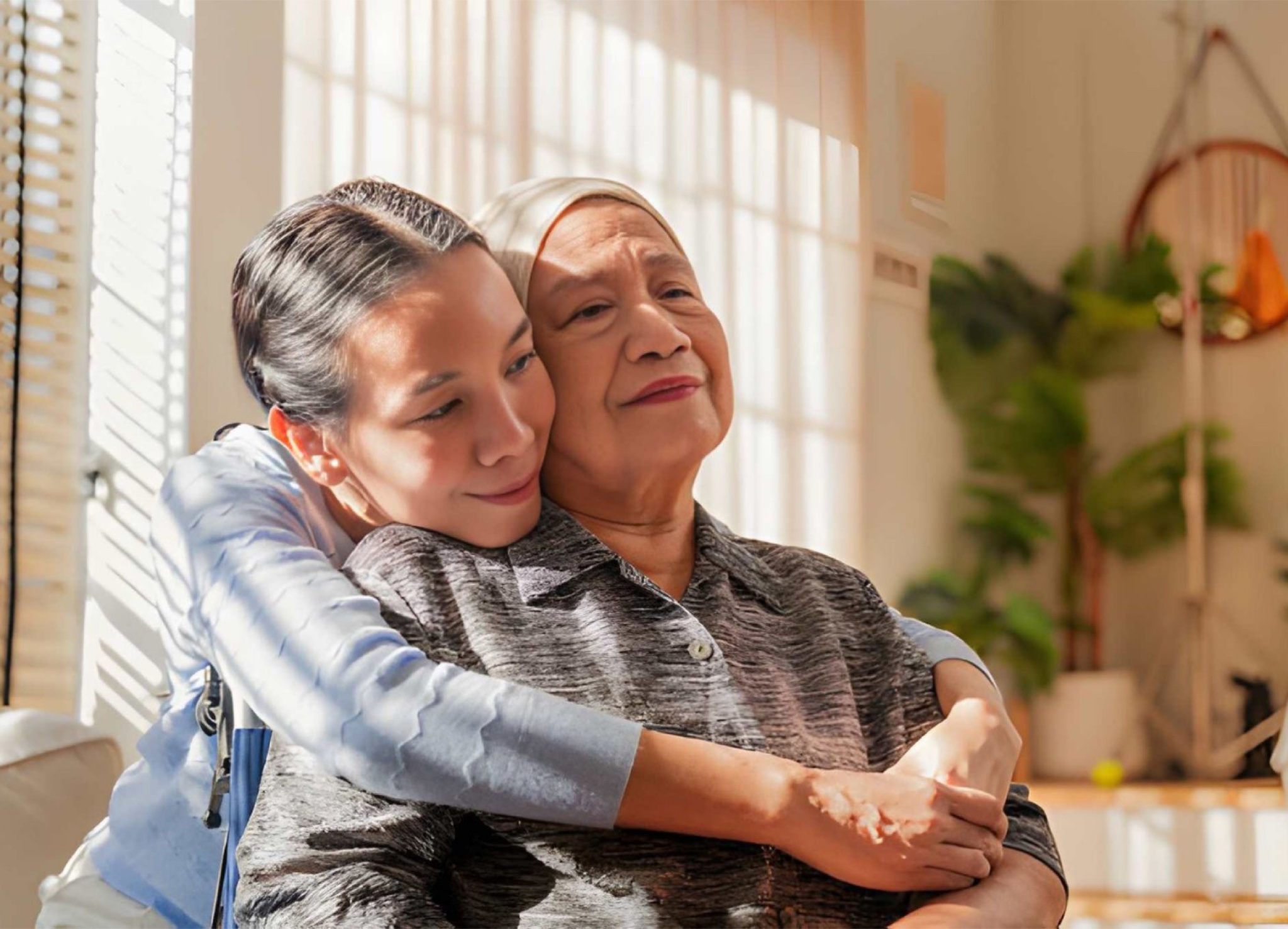 Two women embracing and smiling together
