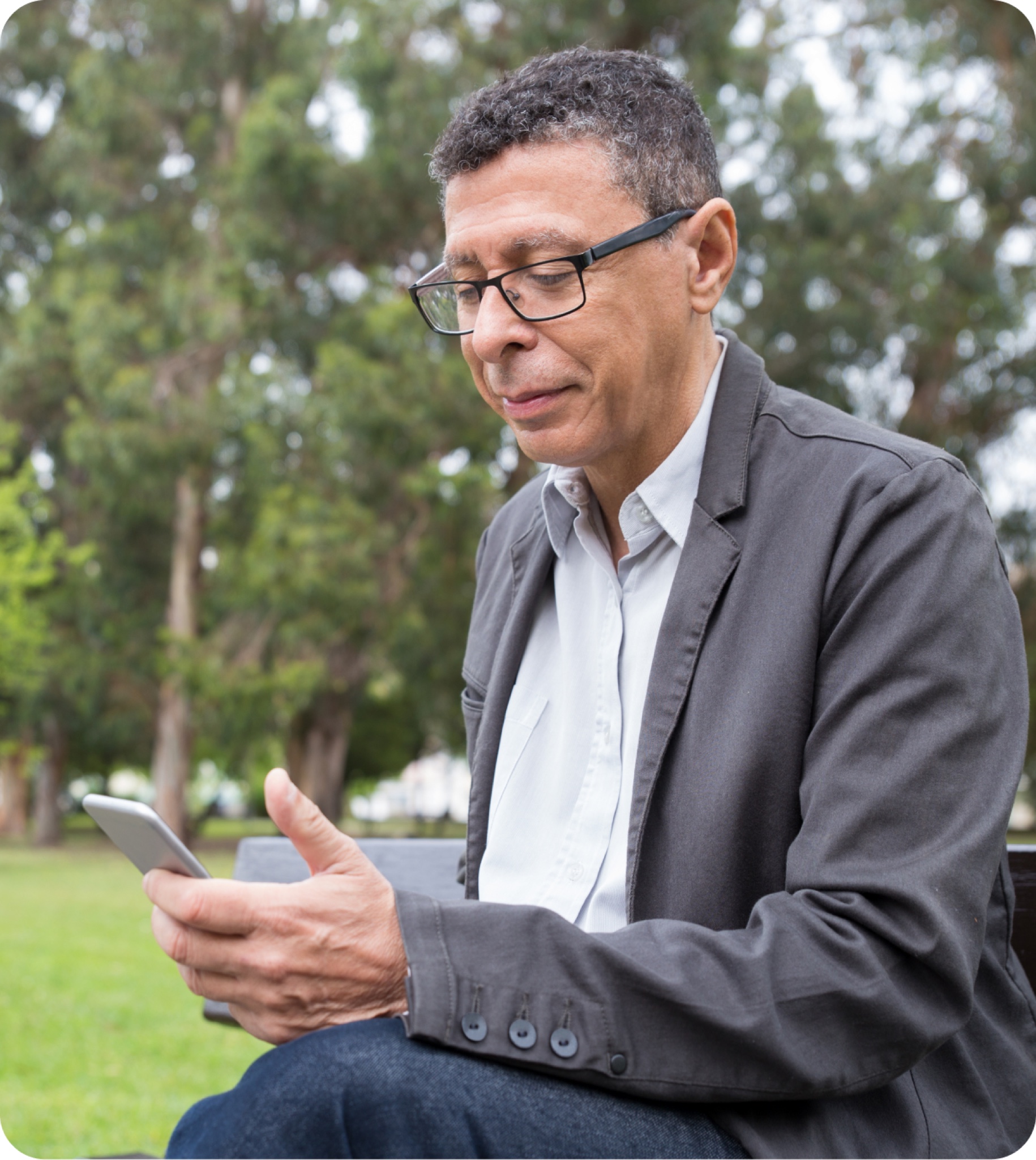 Trial participant reading a message from his mentor on a phone