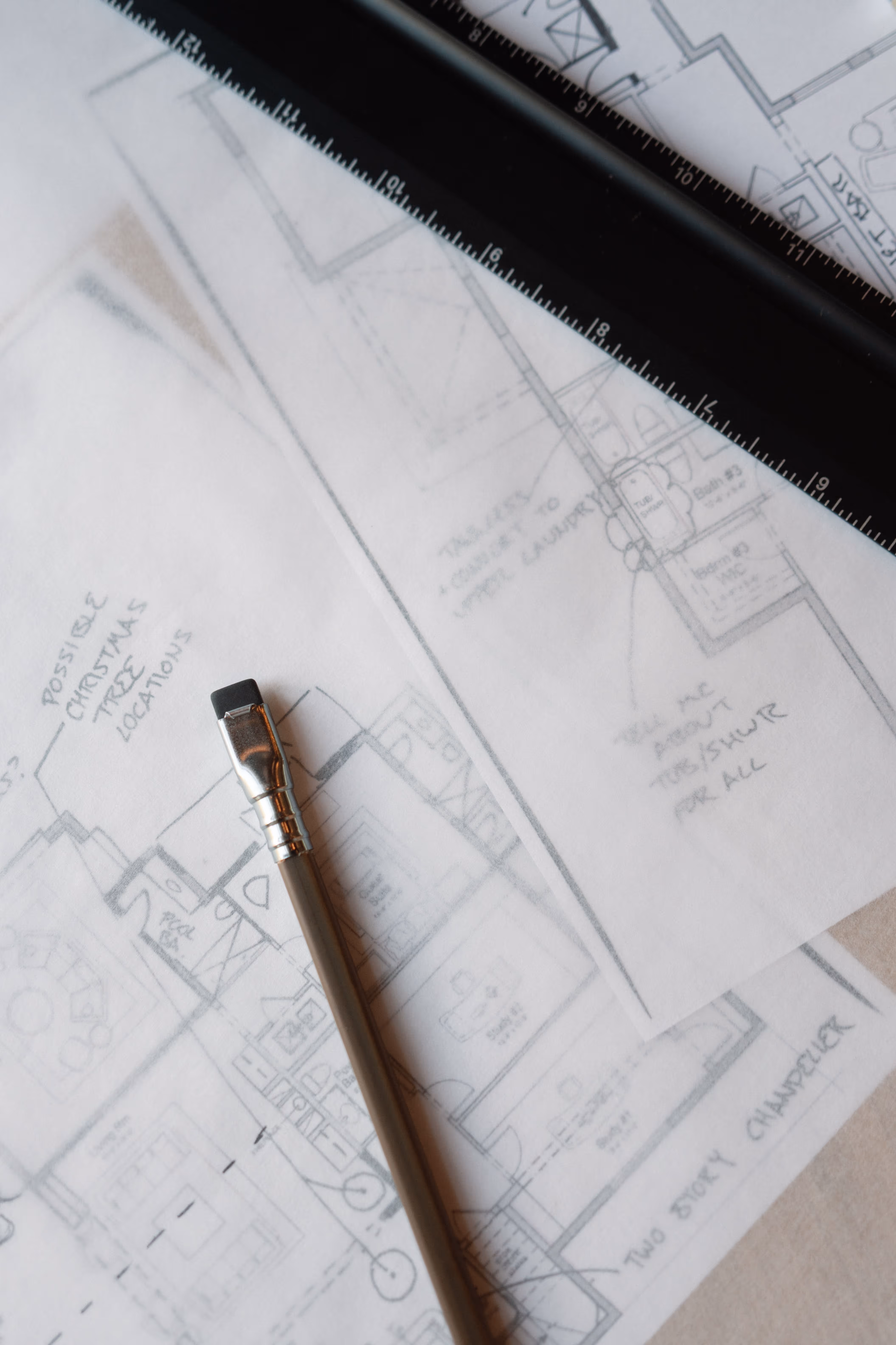 Floor plans with notes and mechanical pencil