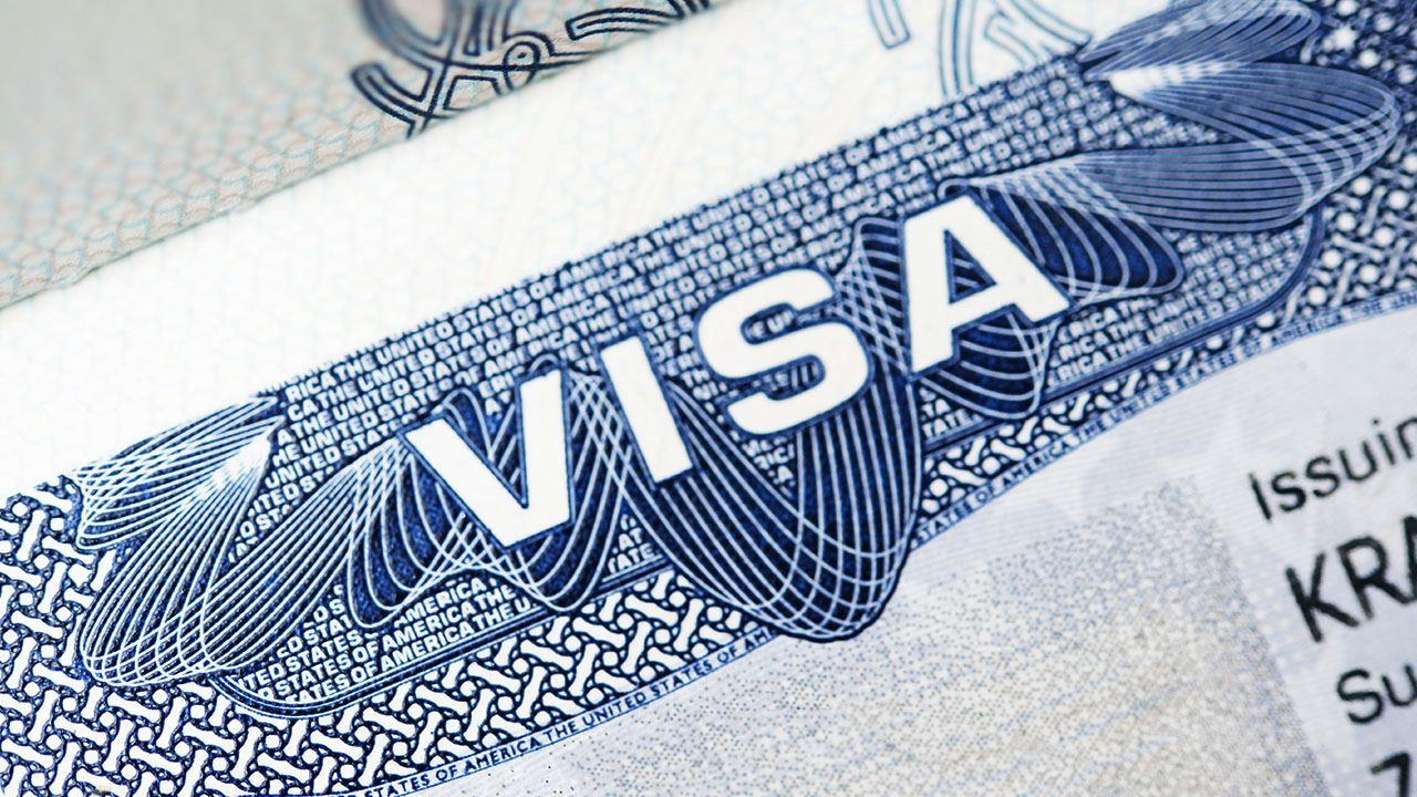 Close up of a US visa document, online processing for employment based immigrant visa petitions