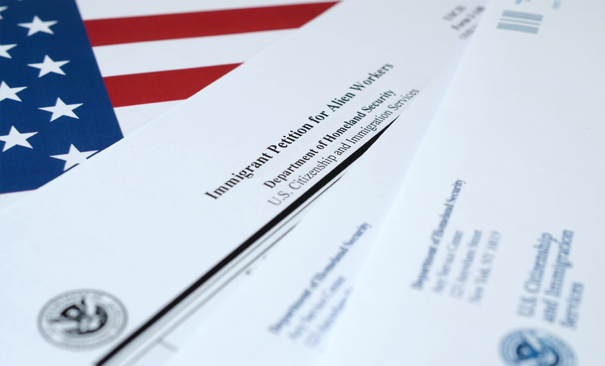 USCIS themed image, 1000 dollar parole fee for certain adjustment of status applicants