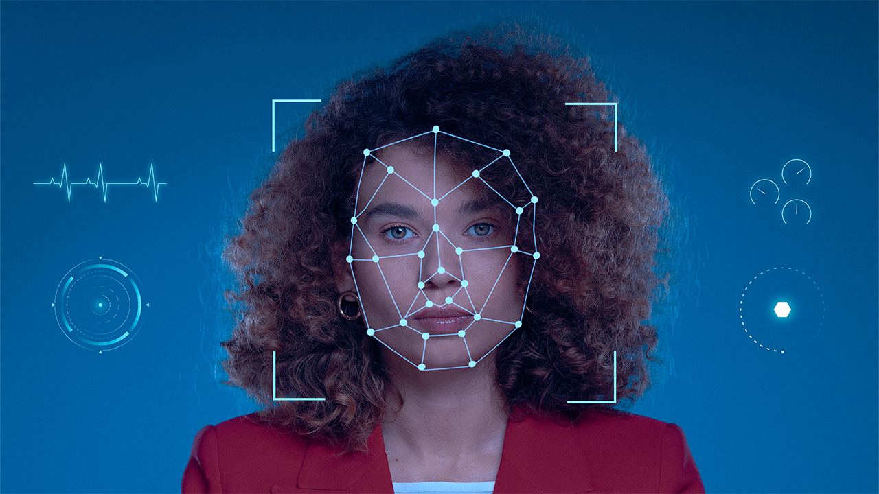 Facial recognition grid mapped over a woman's face, USCIS photo policy for identity verification