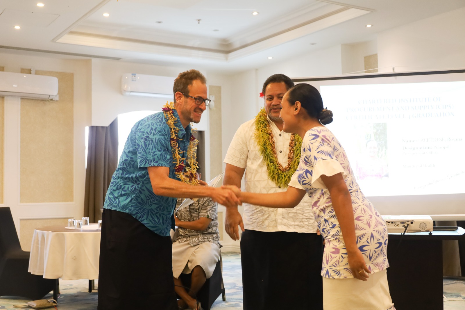 Participant receiving their certificate.