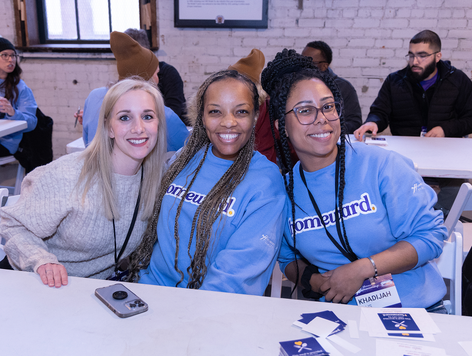 Three Homeward employees smiling at the camera