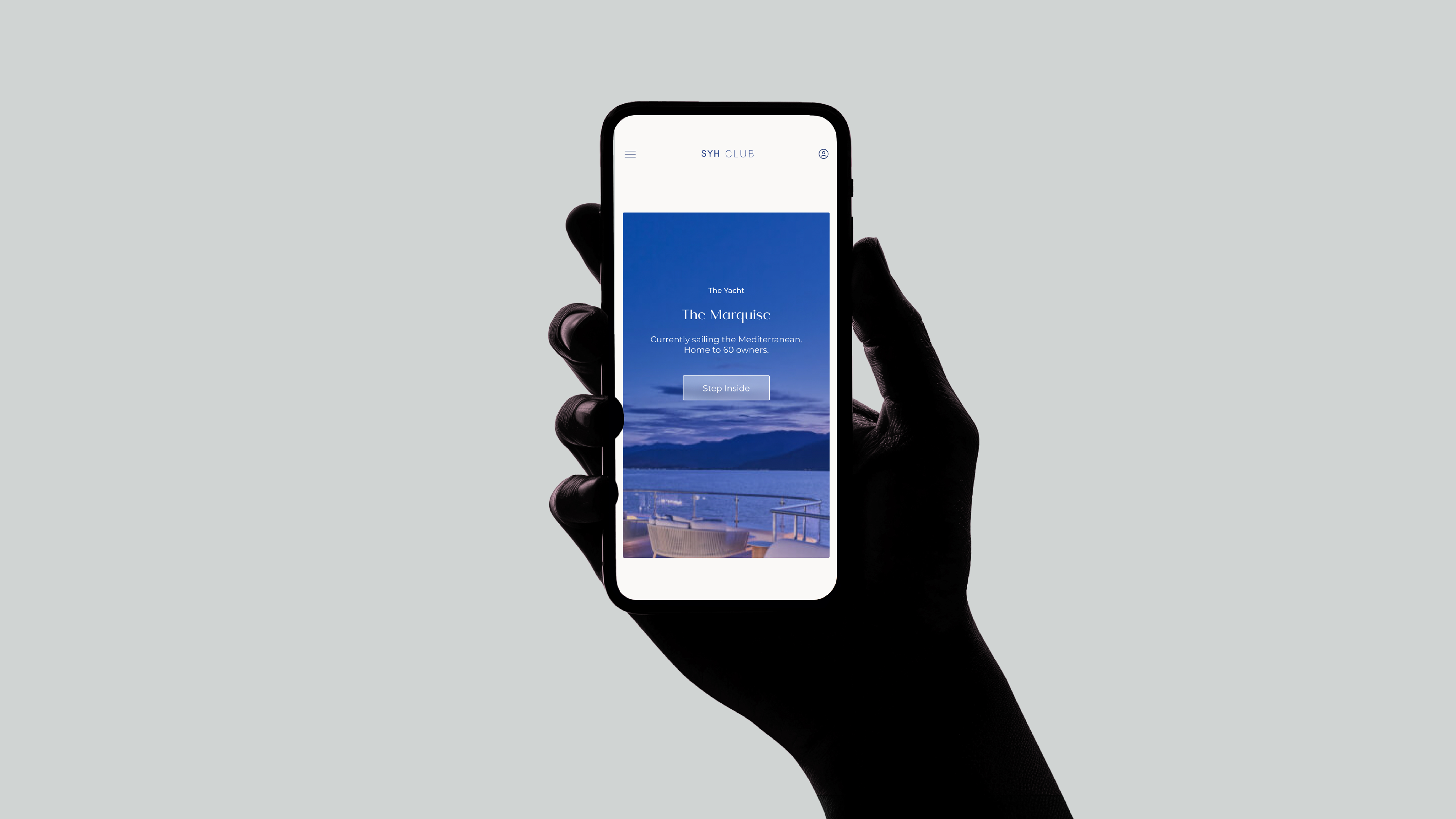 A website designed by Emán Estudio, shown on a phone
