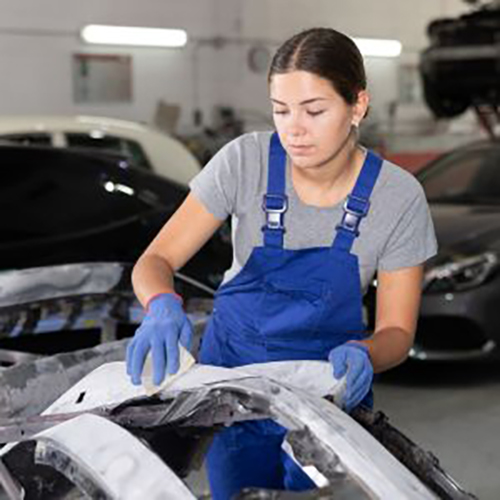 a women is cleaning the car