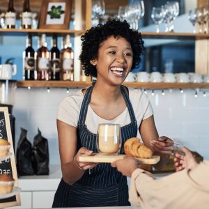 The barista with fresh pastries