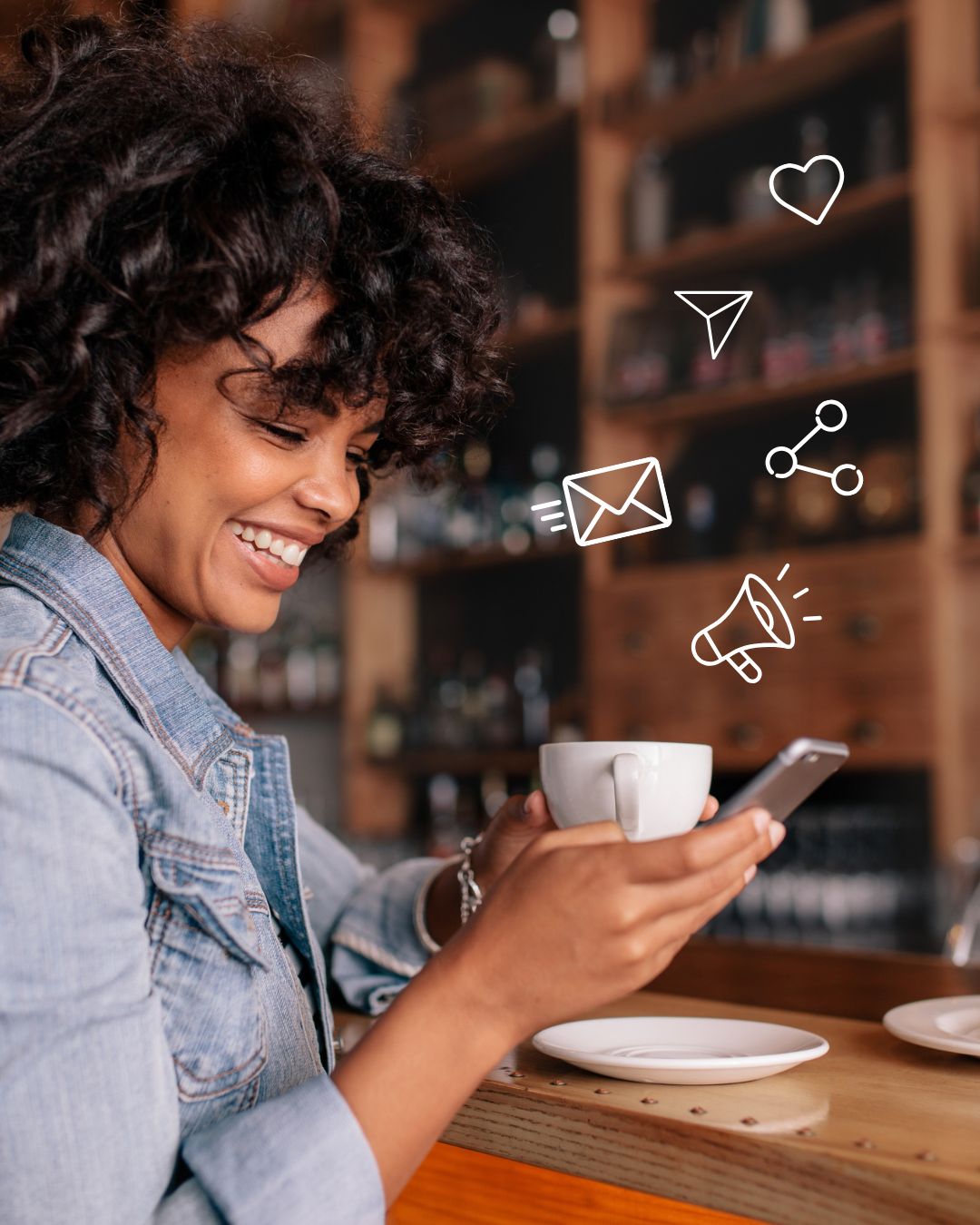 An American woman is smiling while using his phone